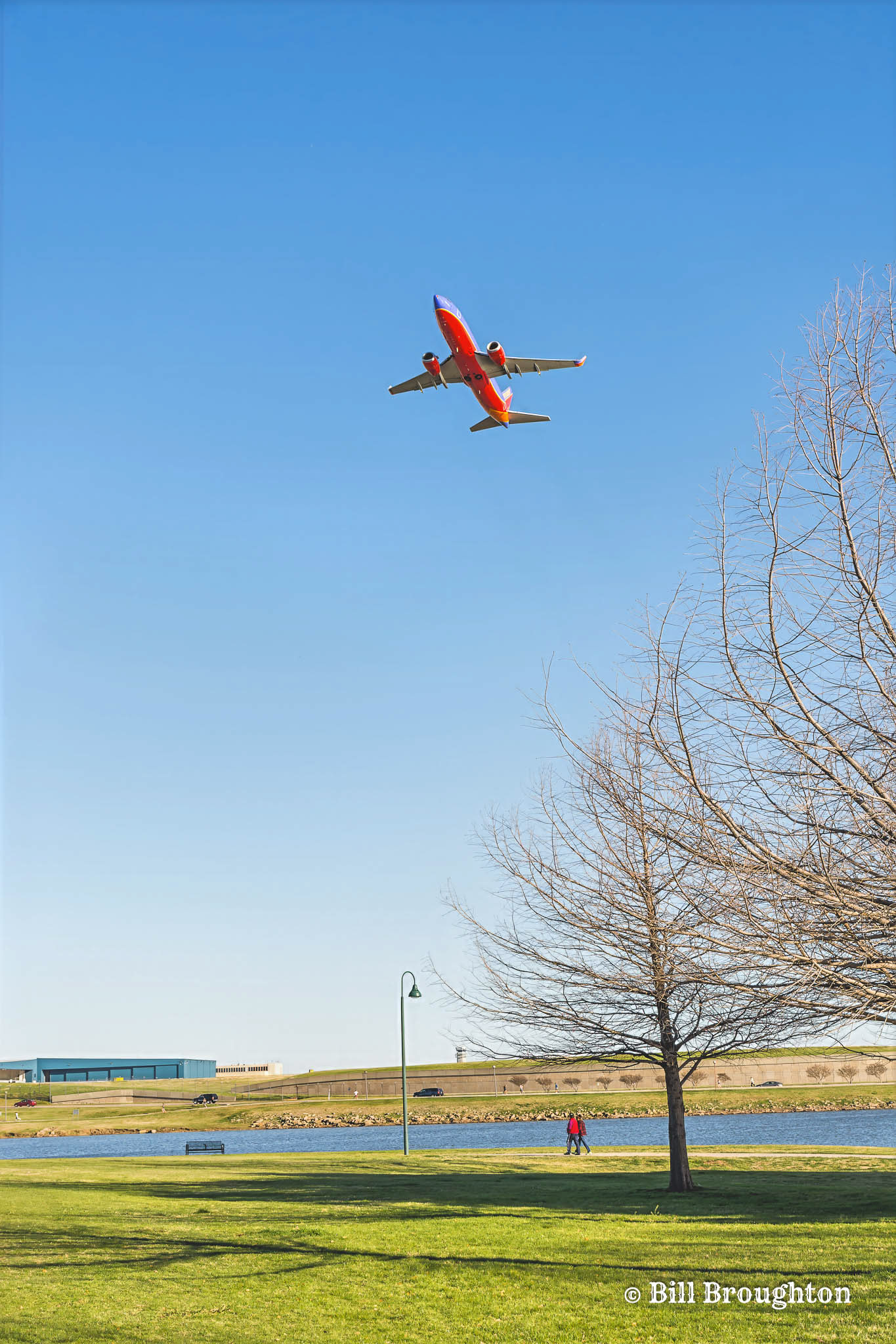 Southwest Airlines Climbing Out From Love Field  Over Bachman Lake