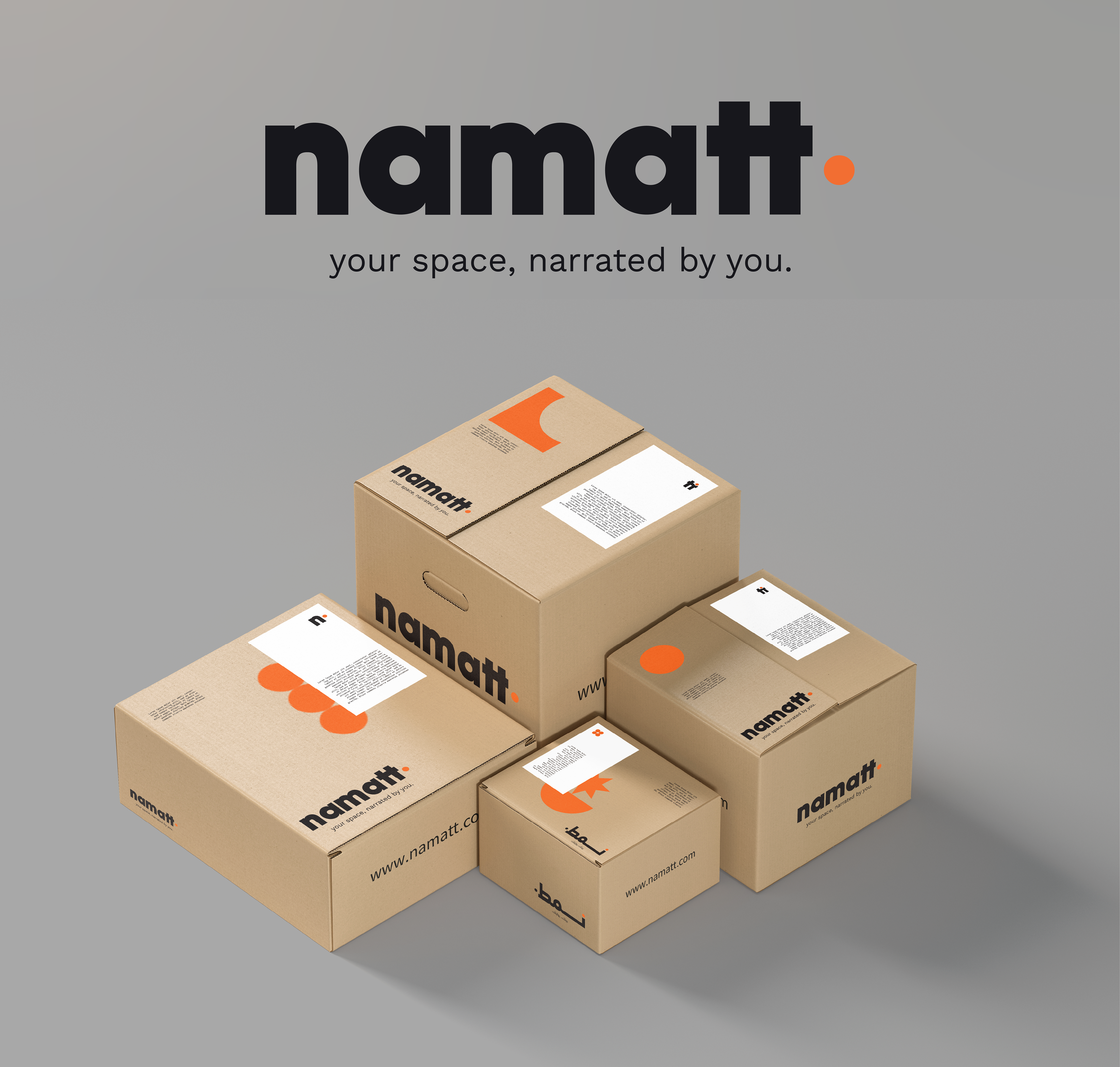 NAMATT wordmark and “your space, narrated by you” tagline above kraft packaging boxes with orange geometric graphics and shipping labels.