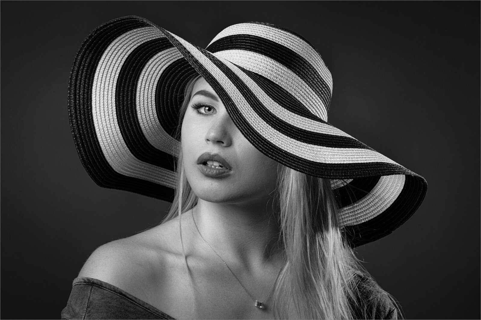 Under a Black and White Hat