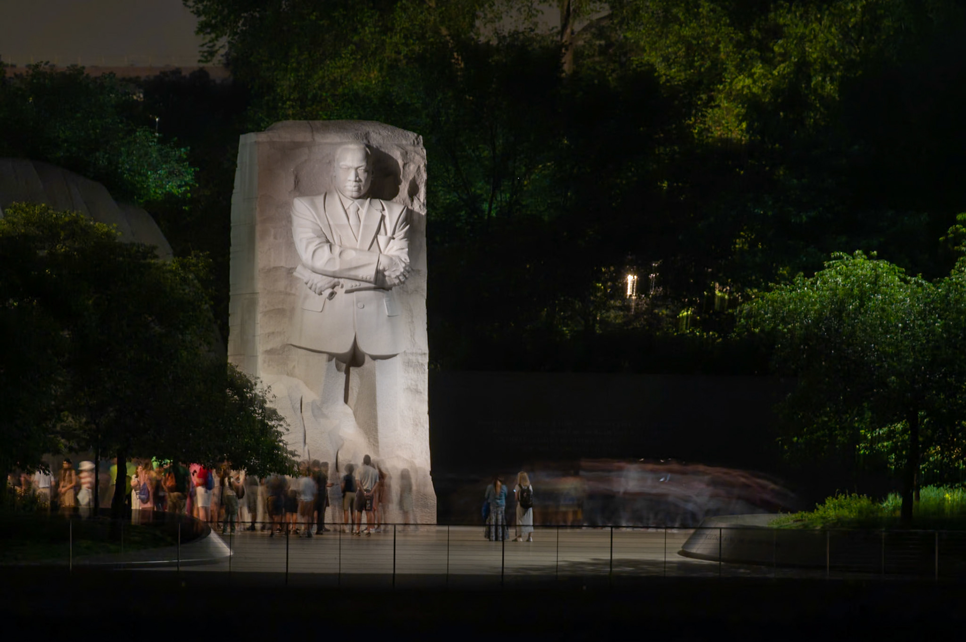 6 second exposure of the MLK Memorial from across the Tidal Basin, Washington DC.  Visitors blurred due to long exposure.