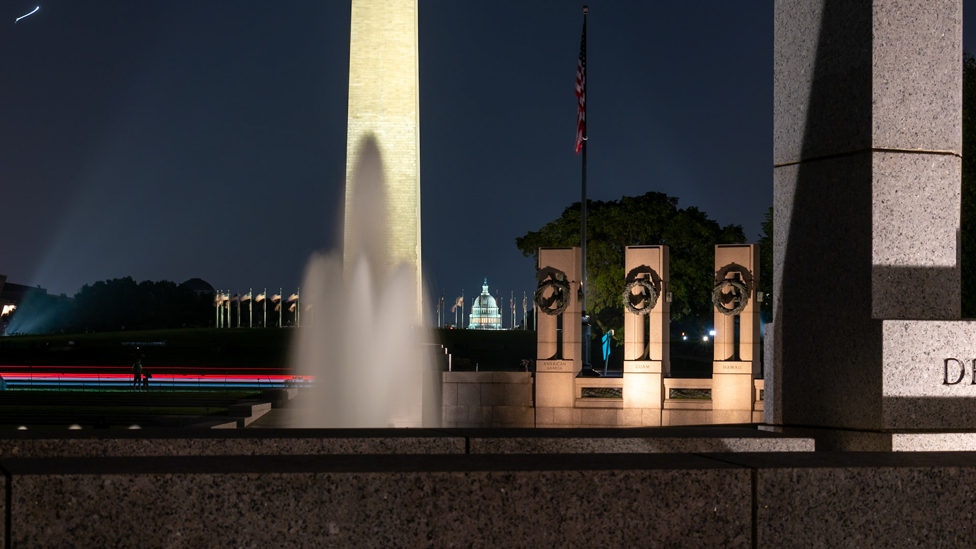 8 second exposure of US Capitol from just beyond the WWII Memorial.  Traffic passing in the middle and plane flying in the upper left.  Washington DC.