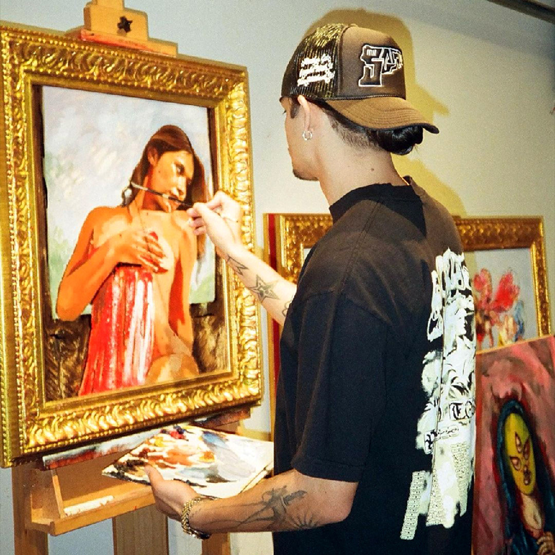 Isaac Pelayo wear Sacred World Tour tee