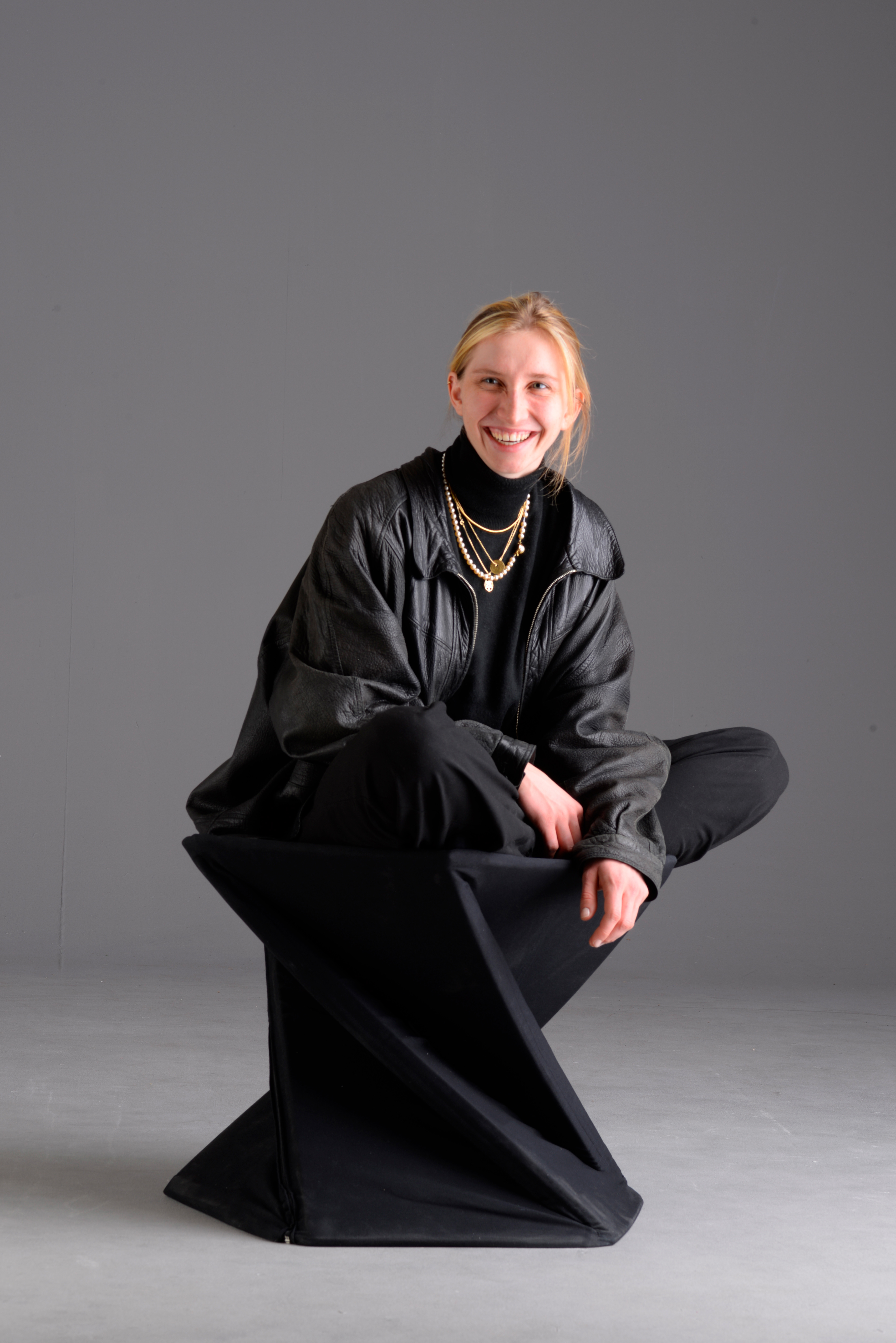 Morph stool mat closed with person sitting