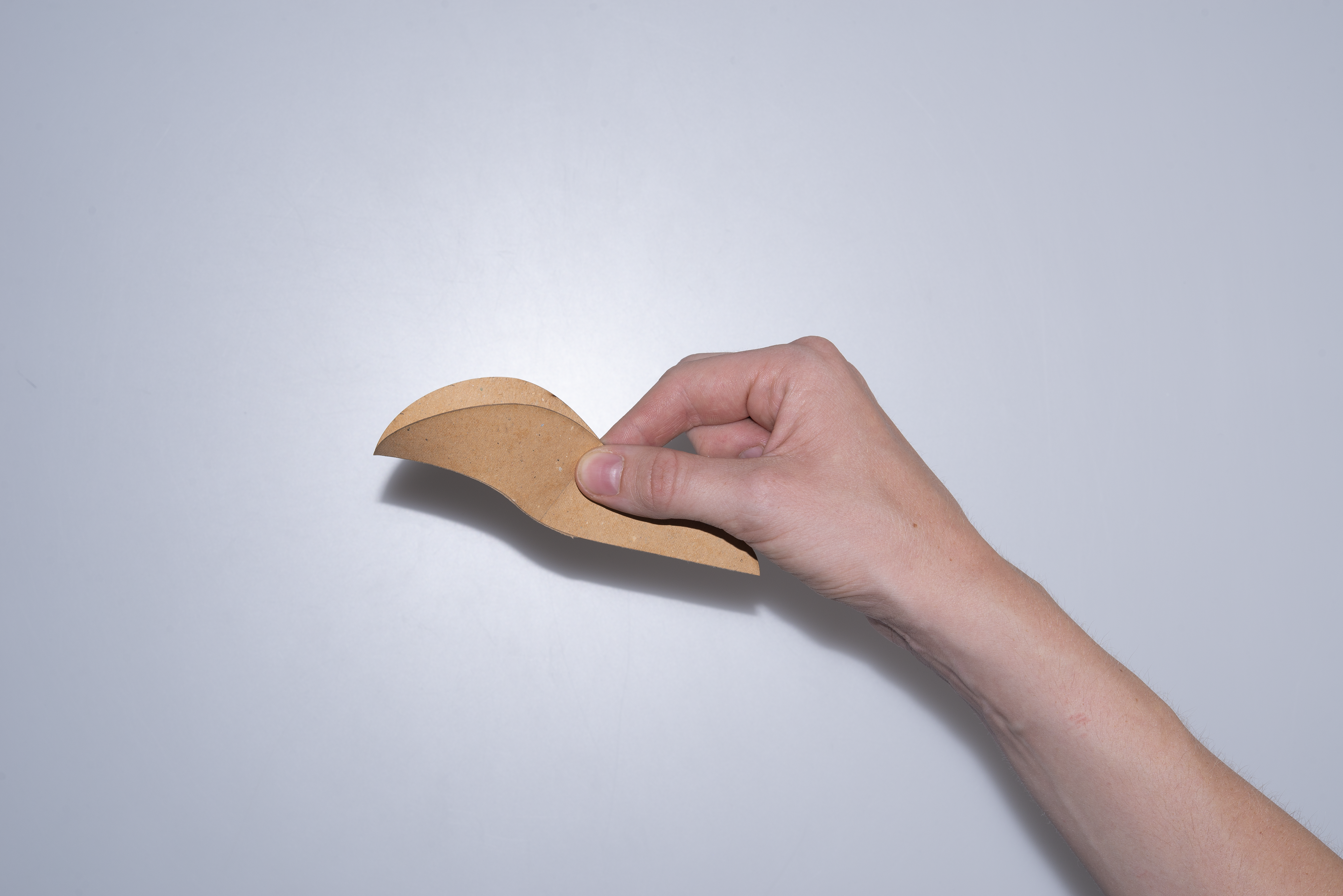 Foldable Protein Scoop closed with hand