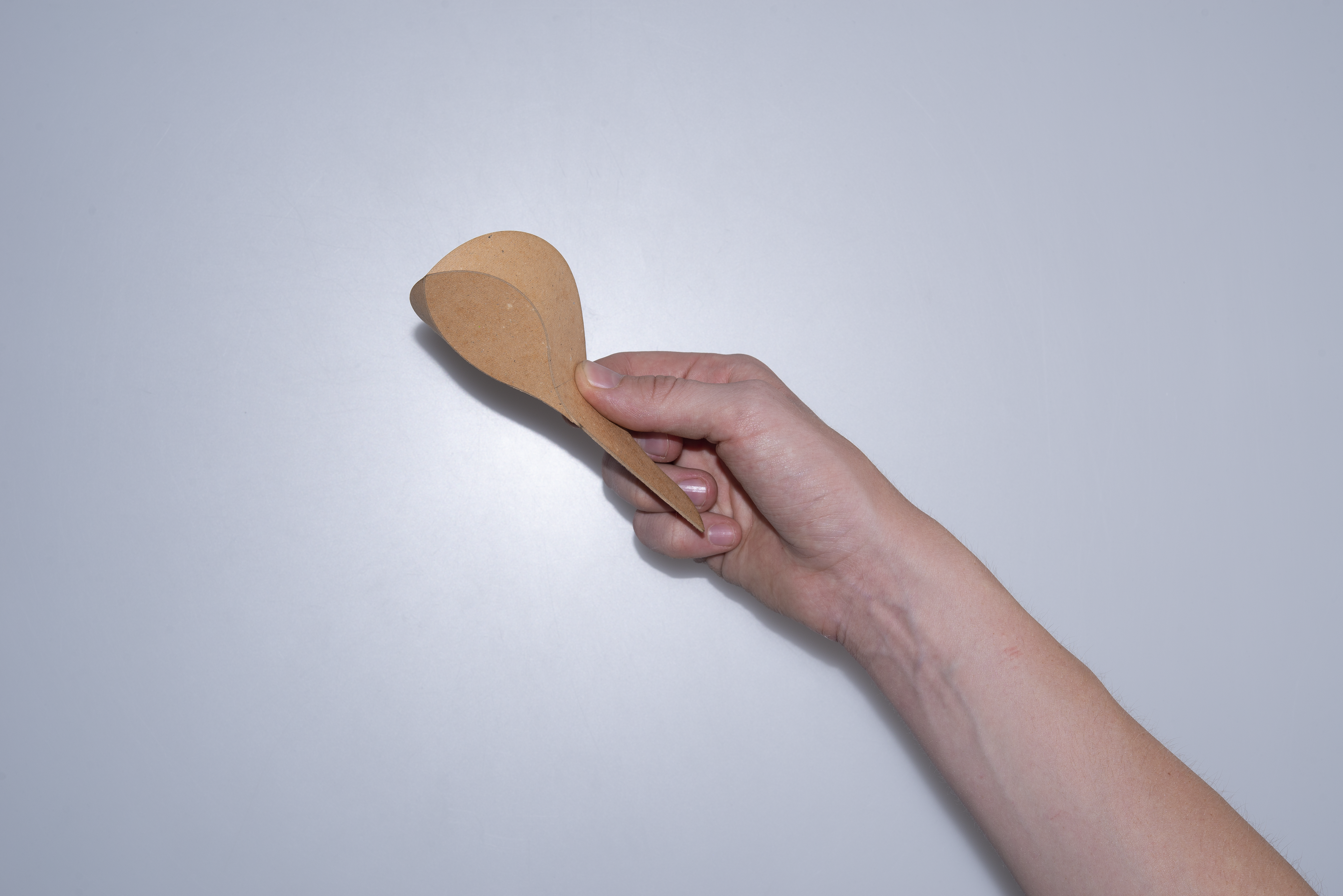 Foldable Protein Scoop closed with hand