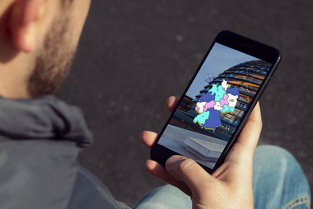 Picture of iPhone with snapchat sticker designed by Adrian Bauer