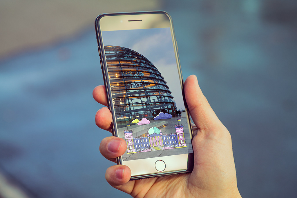 Picture of iPhone with snapchat sticker designed by Adrian Bauer