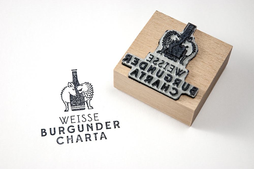 Stamp of Weisse Burgunder Charta logo design by Adrian Bauer