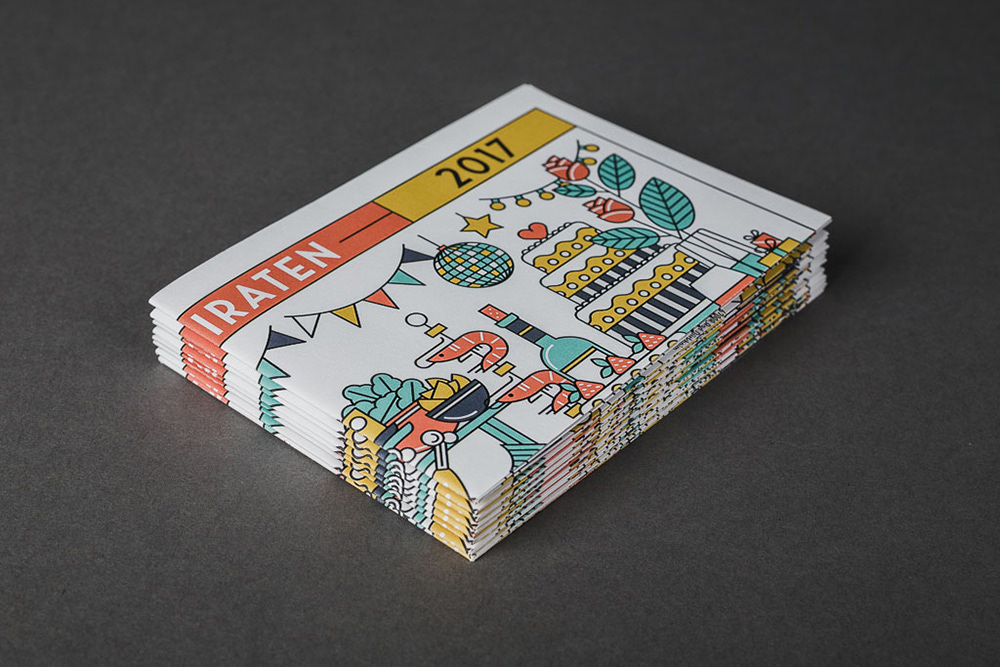 Close-up of printed illustrative wedding cards by Adrian Bauer