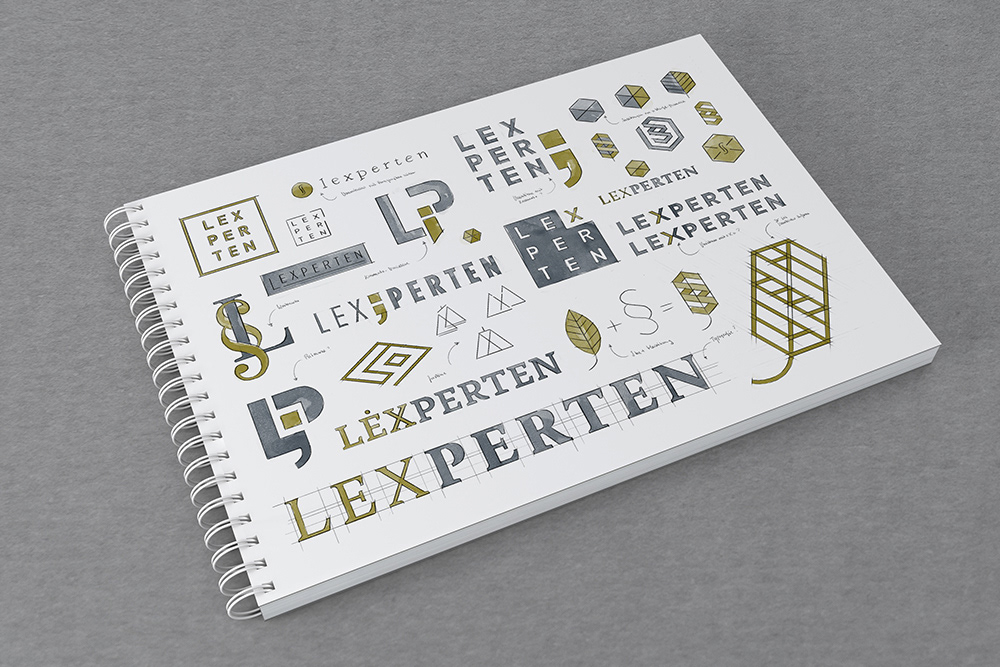 Sketch of different logo variations by Adrian Bauer