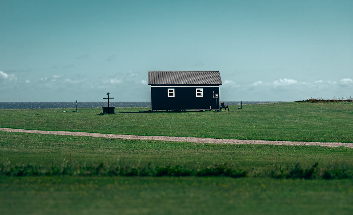 Solitary cabin by the sea.