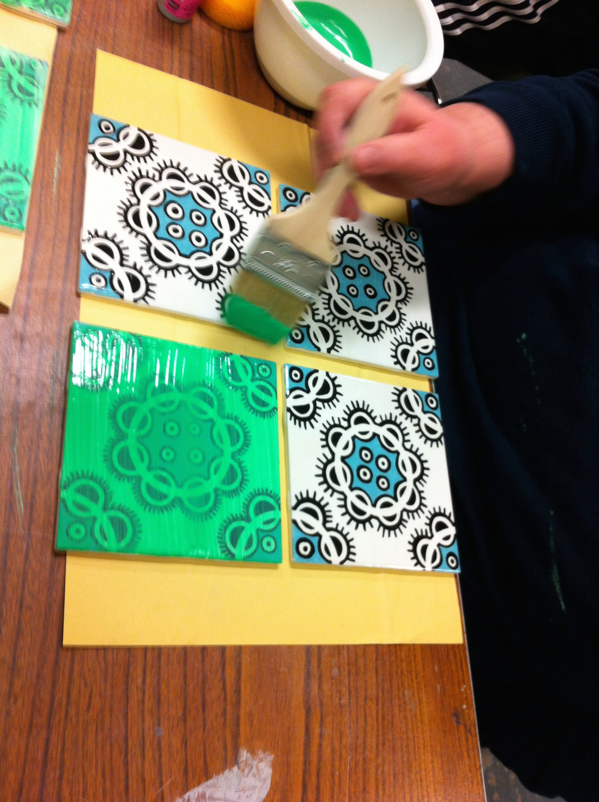 Painting glaze on tiles