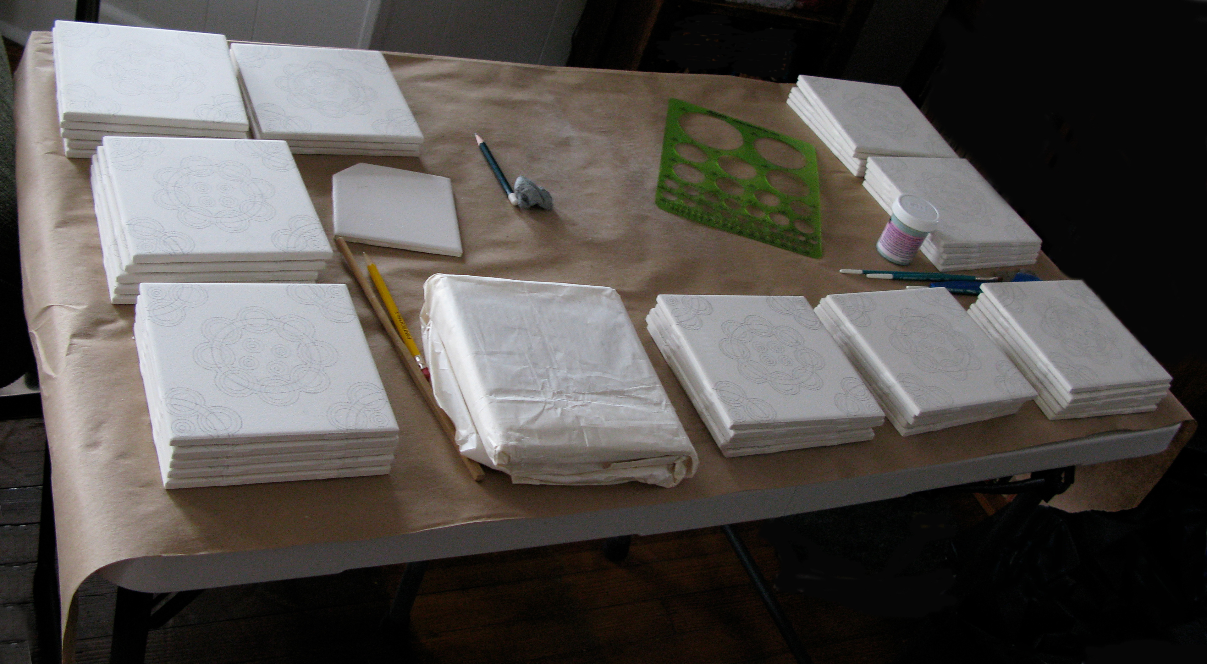 Table set up for drawing on the tiles with pencil, 2013