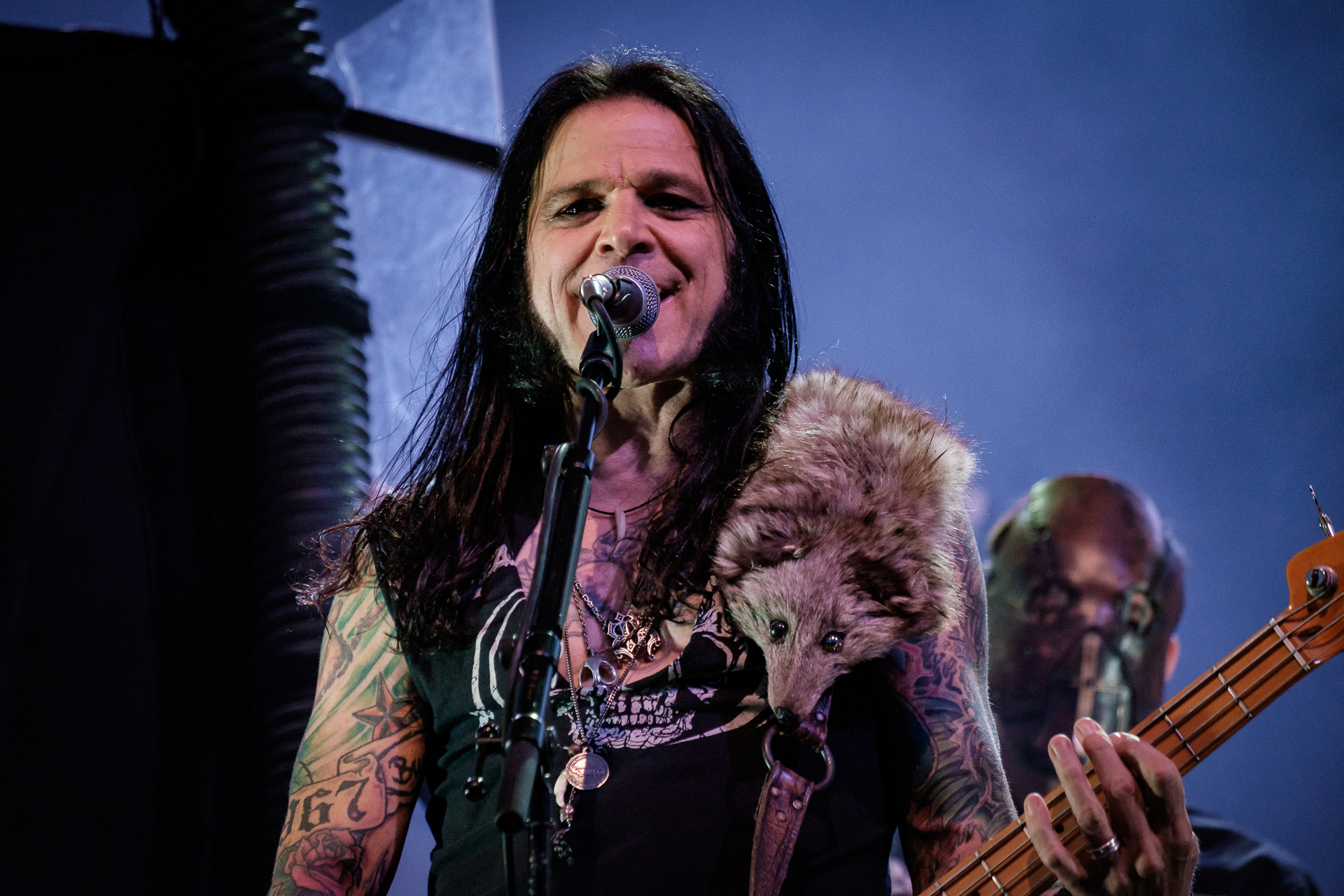 Chuck Garric and his little friend (not counting the sideburns) playing bass with Alice Cooper at Liseberg in Göteborg, Sweden.