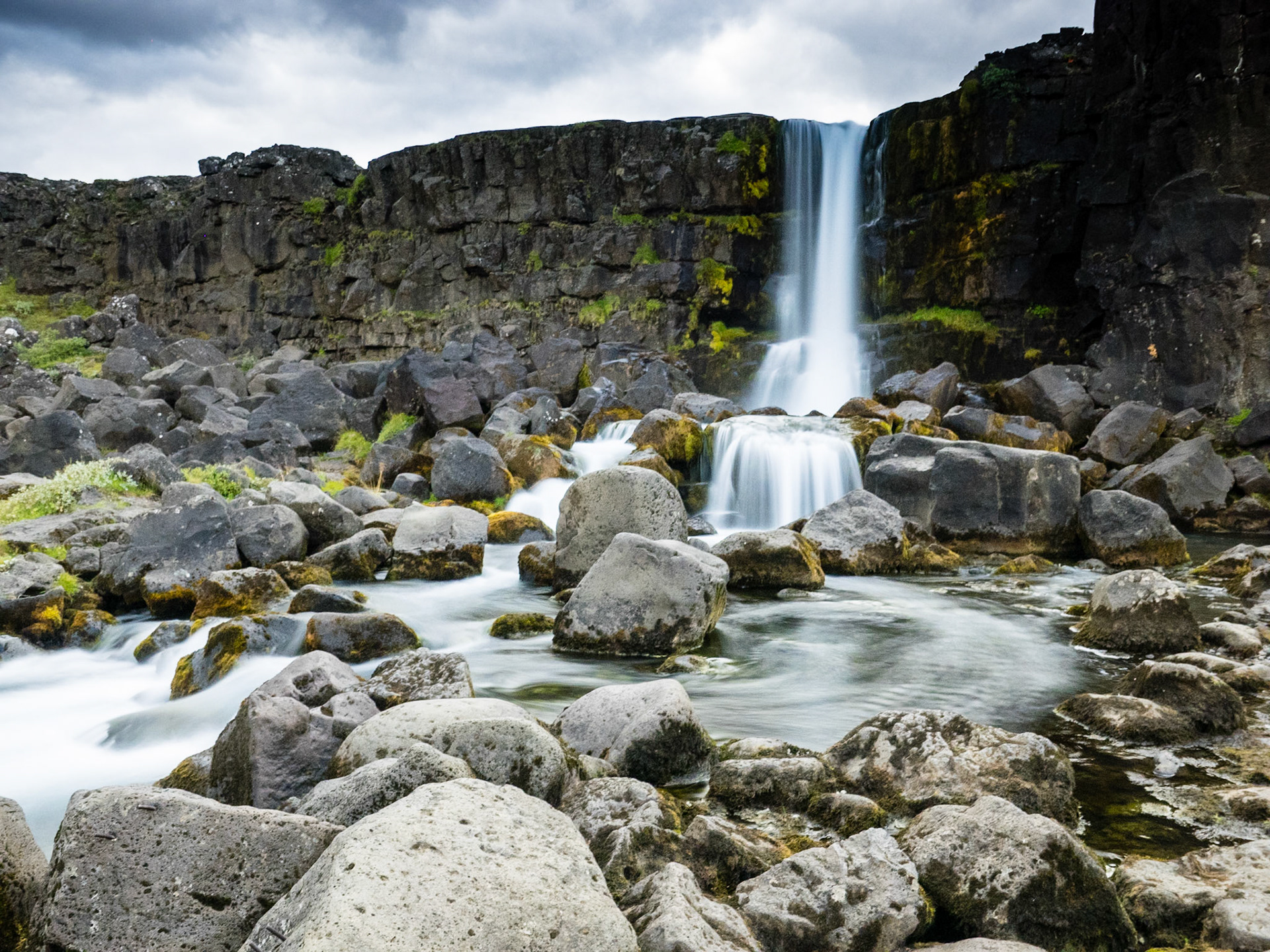 Oxara Waterfall, Pingvellir Iceland: The Oxara River flows off of the western (North American) plate  over a basalt cliff en route to the rift valley floor at Pingvellir.