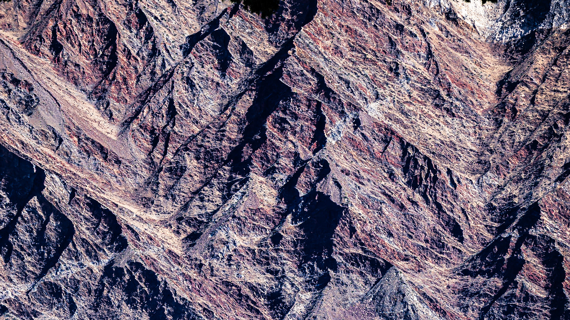 Coyote Mountain Abstract: Rugged beauty, reddish hues and textures are revealed in this out-of-context view of Coyote Mountain In the Anza-Borrego Desert State Park.