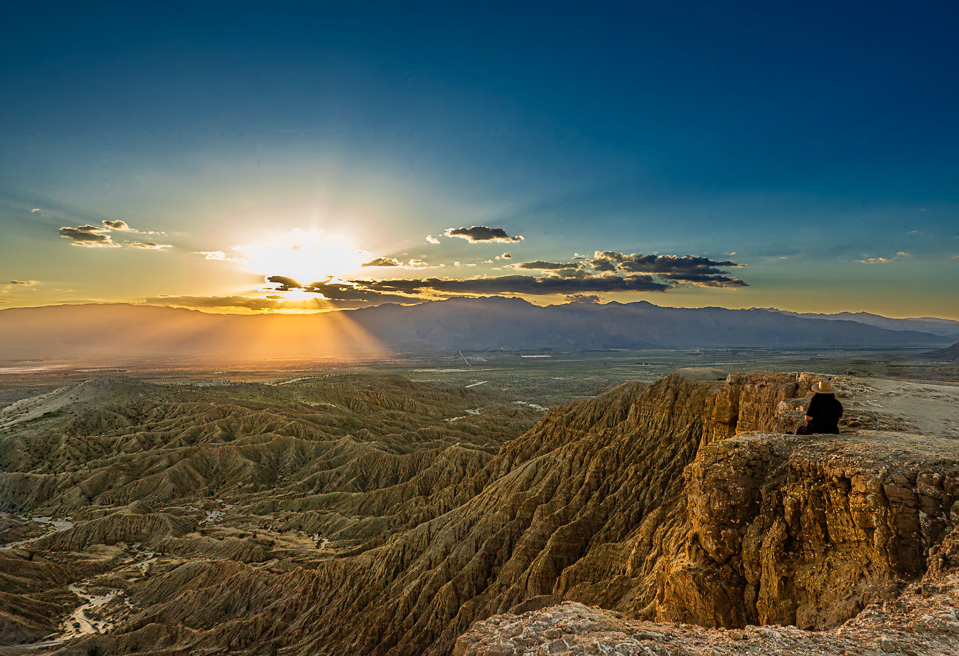 Sunset over the San Ysidro Mountains with the Borrego Valley and Badlands in the foreground. viewed from Font's Point in the Anza-Borrego Desert.