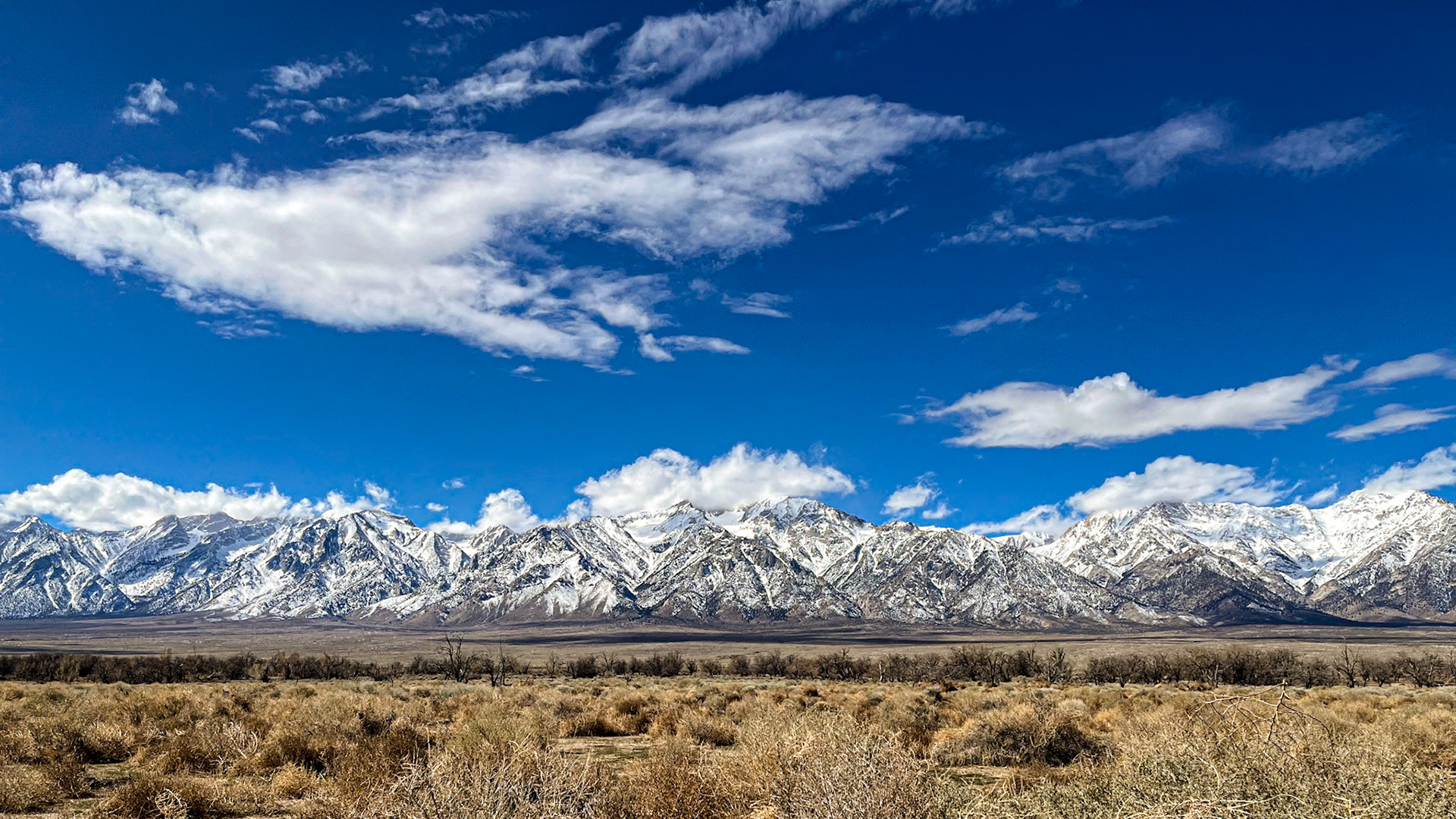 Owens Valley and the Sierrra Nevada: The magnifgicent Sierra Nevada Mountains viewed across the Owens Valley from the Manzanar National Historic site (formerly a WWII era Japanese  Internment Camp).  The Owens Valley is high desert sitting at about 4,000-ft and receiving less than 5 inches of rain per year.