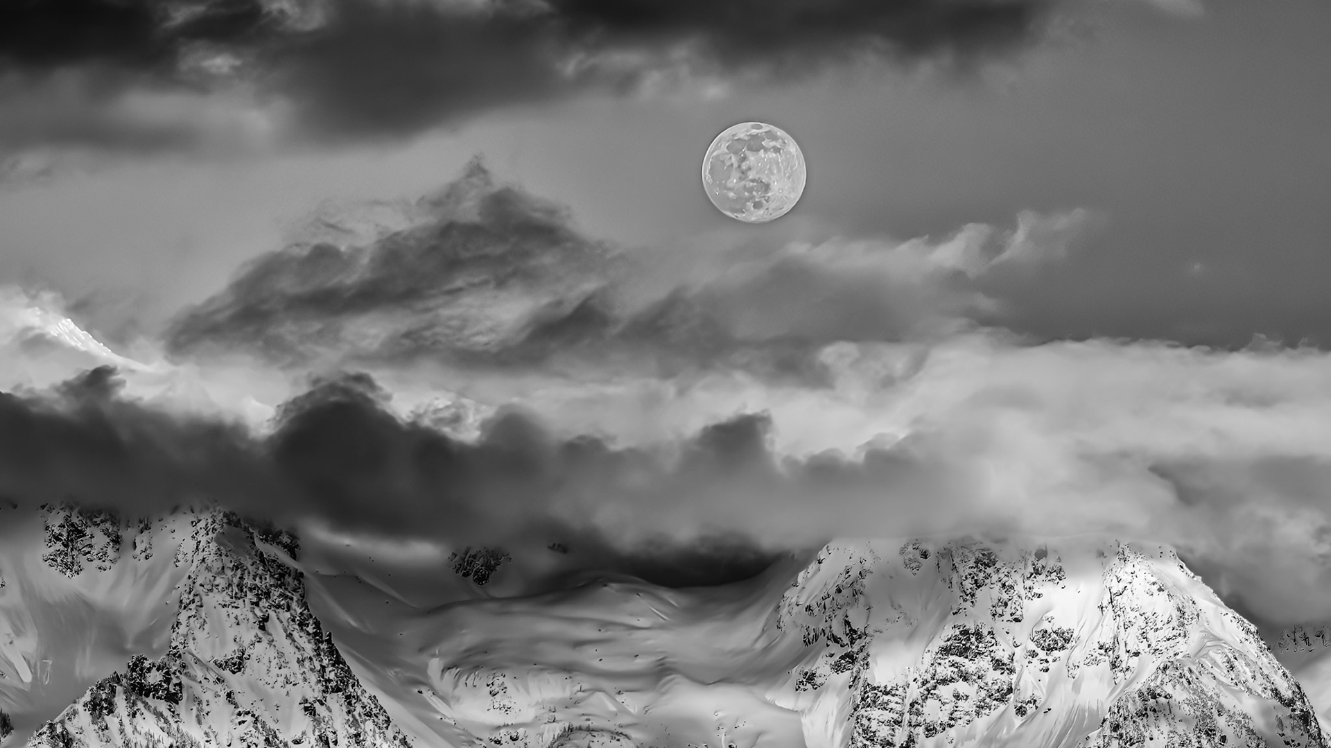 Twin Peaks Moonrise Black-and-White: The clouds parted on an overcast day to reveal the moon rising above Twin Peaks near Mt. Baker in the Washington Cascades