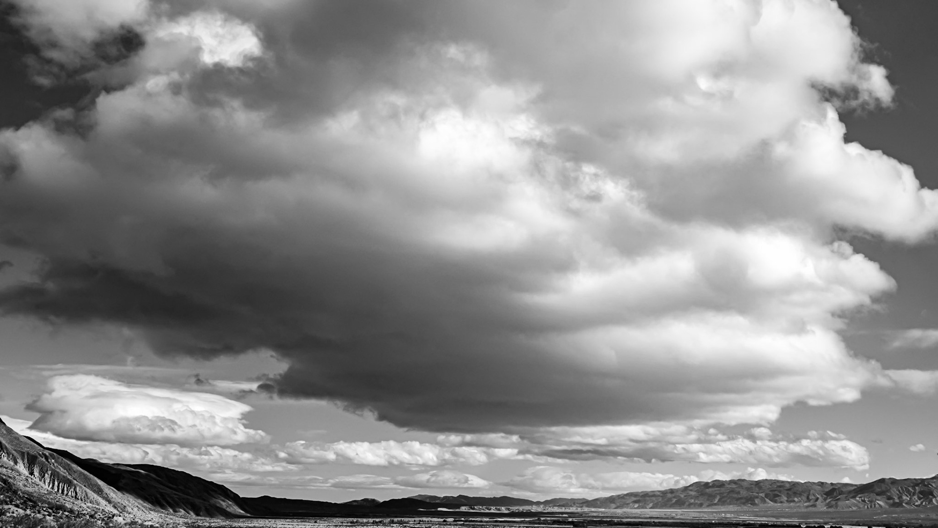 Desert Clouds - B&amp;W: These puffy stratocumulus clouds look ominous but usually signify dry weather or light rain.