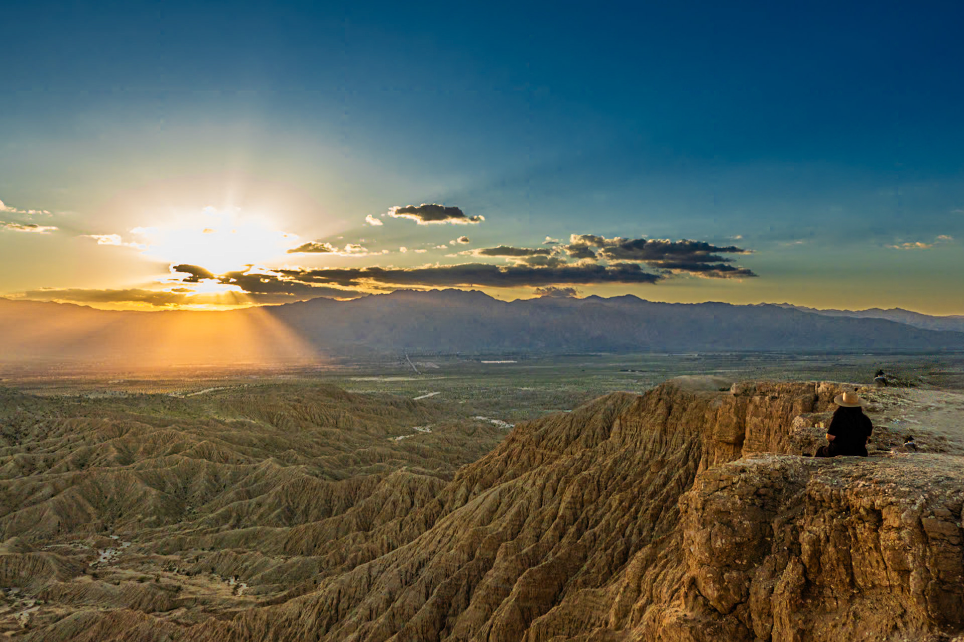 Borrego Sunset: Sunset over the San Ysidro Mountains with the Borrego Valley and Badlands in the foreground. viewed from Font's Point in the Anza-Borrego Desert.