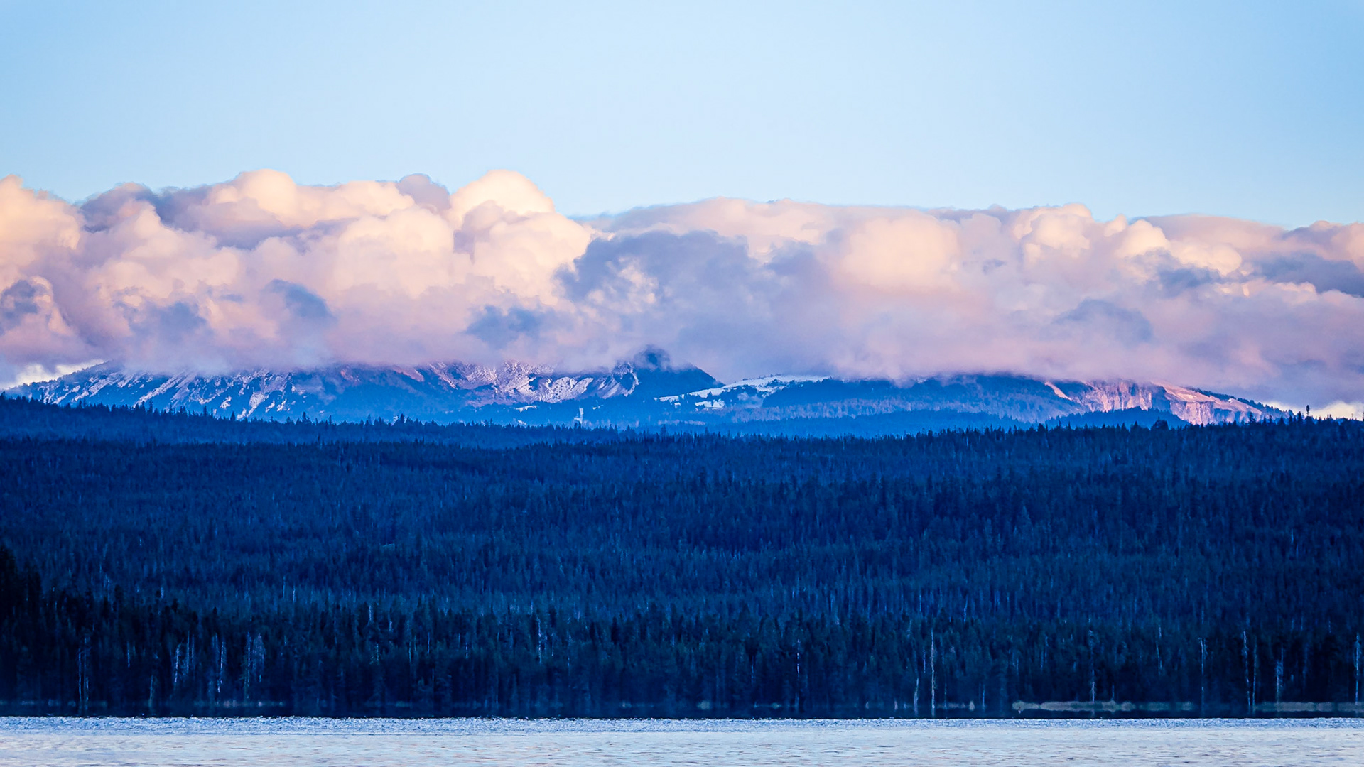 Mt. Mazama Golden Hour: Mt. Mazama cloaked in clouds following a refreshing day of wind, rain and snow that was greatly needed to drive away forest fire smoke.