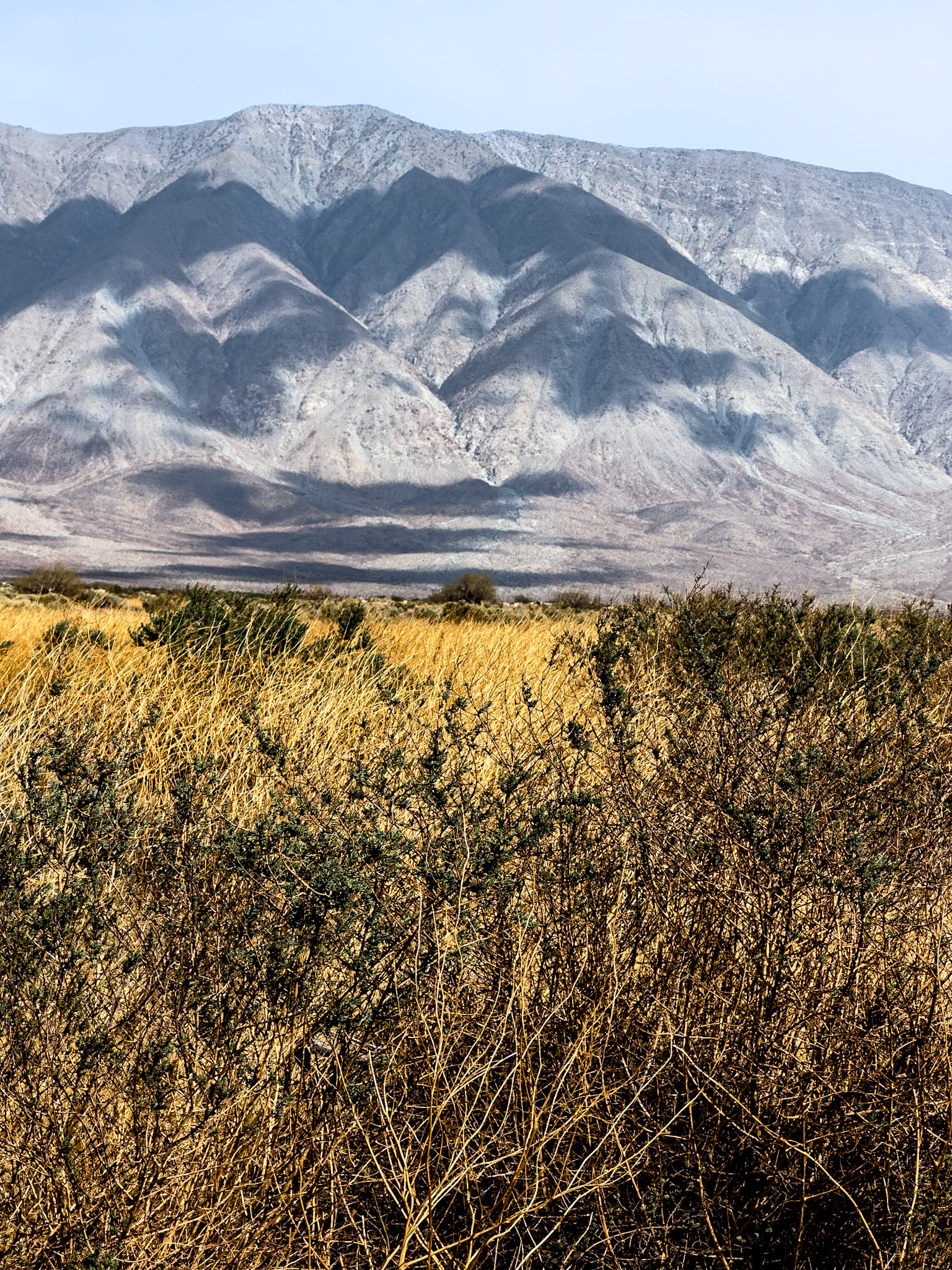 Santa Rosa's Face: Cloud shadows drift across the wrinkled ridges and valleys to give a face to Santa Rosa Mountain.