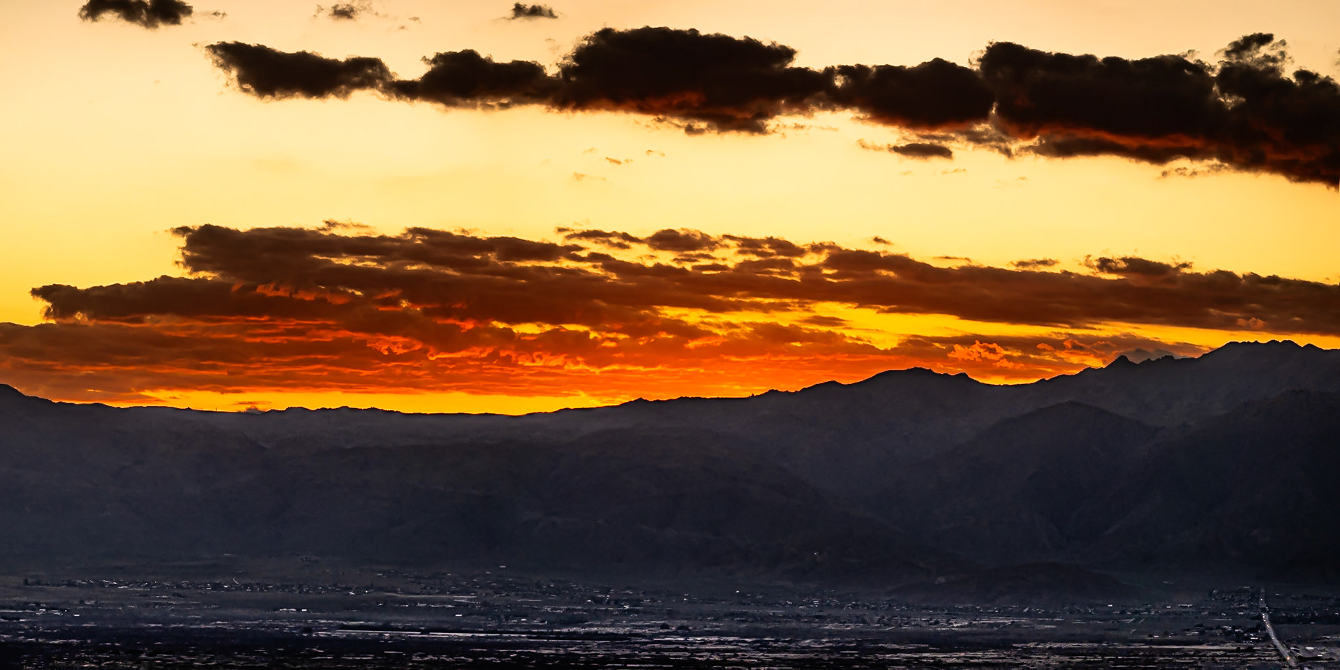 Borrego Valley Golden Hour: Dusk settles over Borrego Spings and the Borrego Valley as the sunsets behind the San Ysidro Mountains.