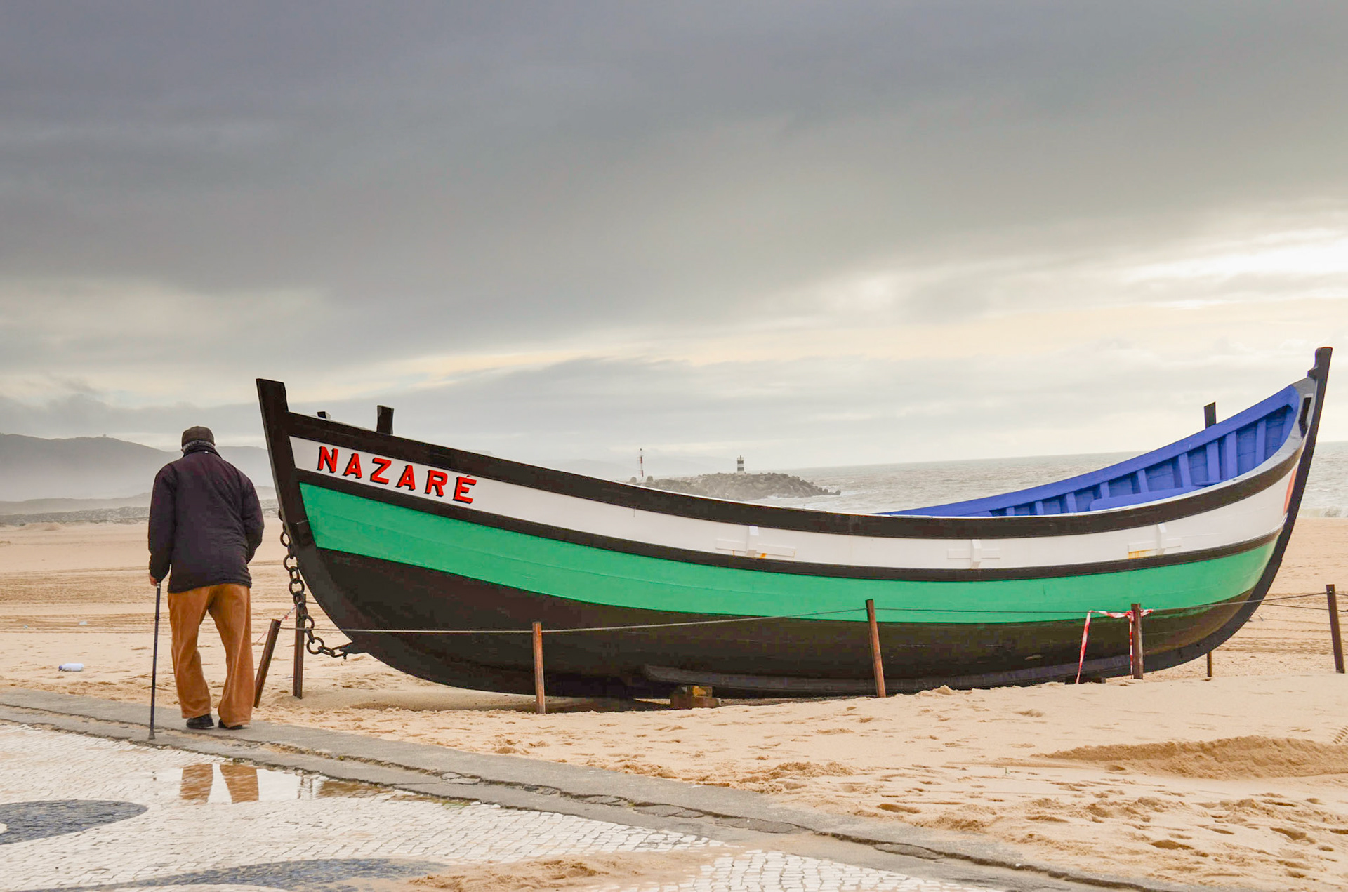 Old fishing boat on the beach - Nazare, Portugal