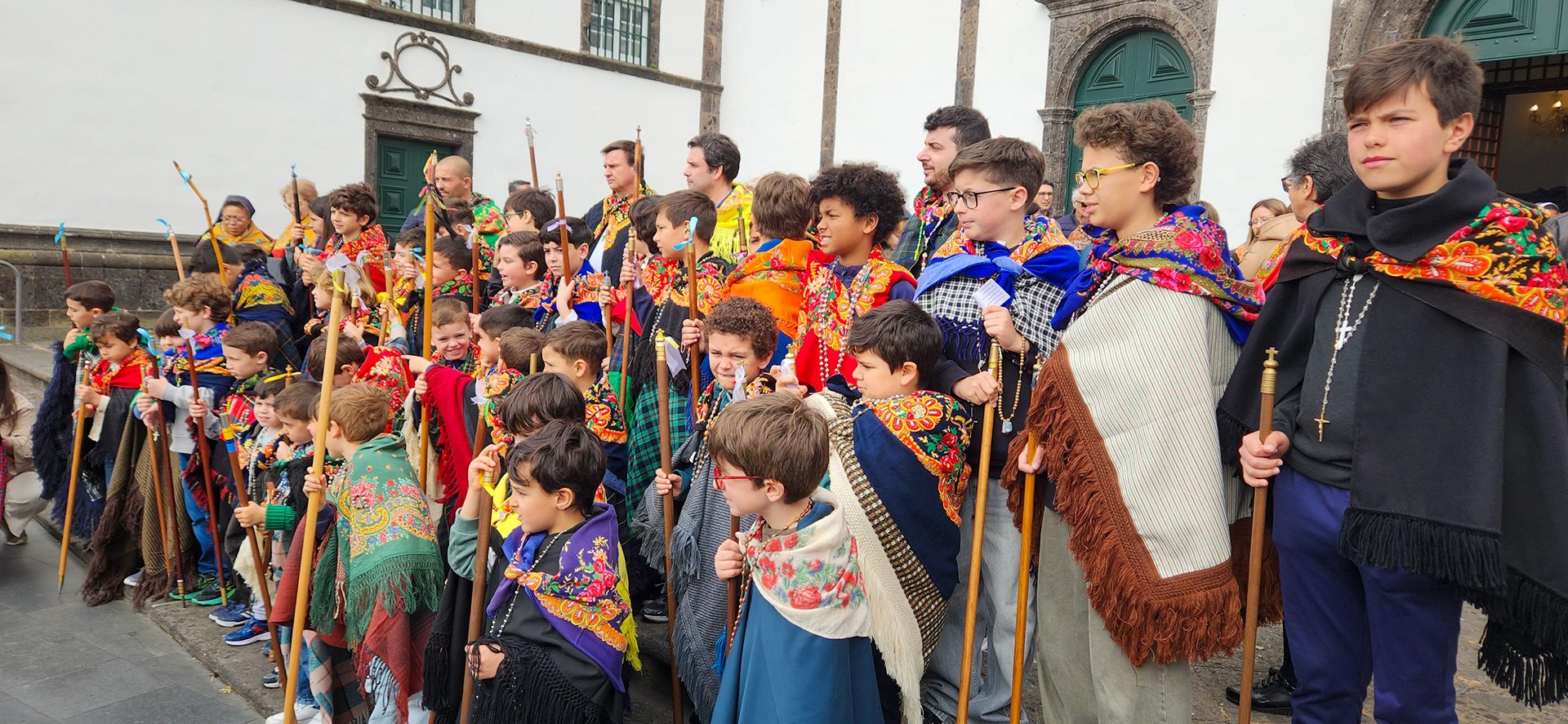 A group of Children practicing the Holy Week tradition of Romeiros (pilgrims) in Ponta Delgada, Azores, Portugal