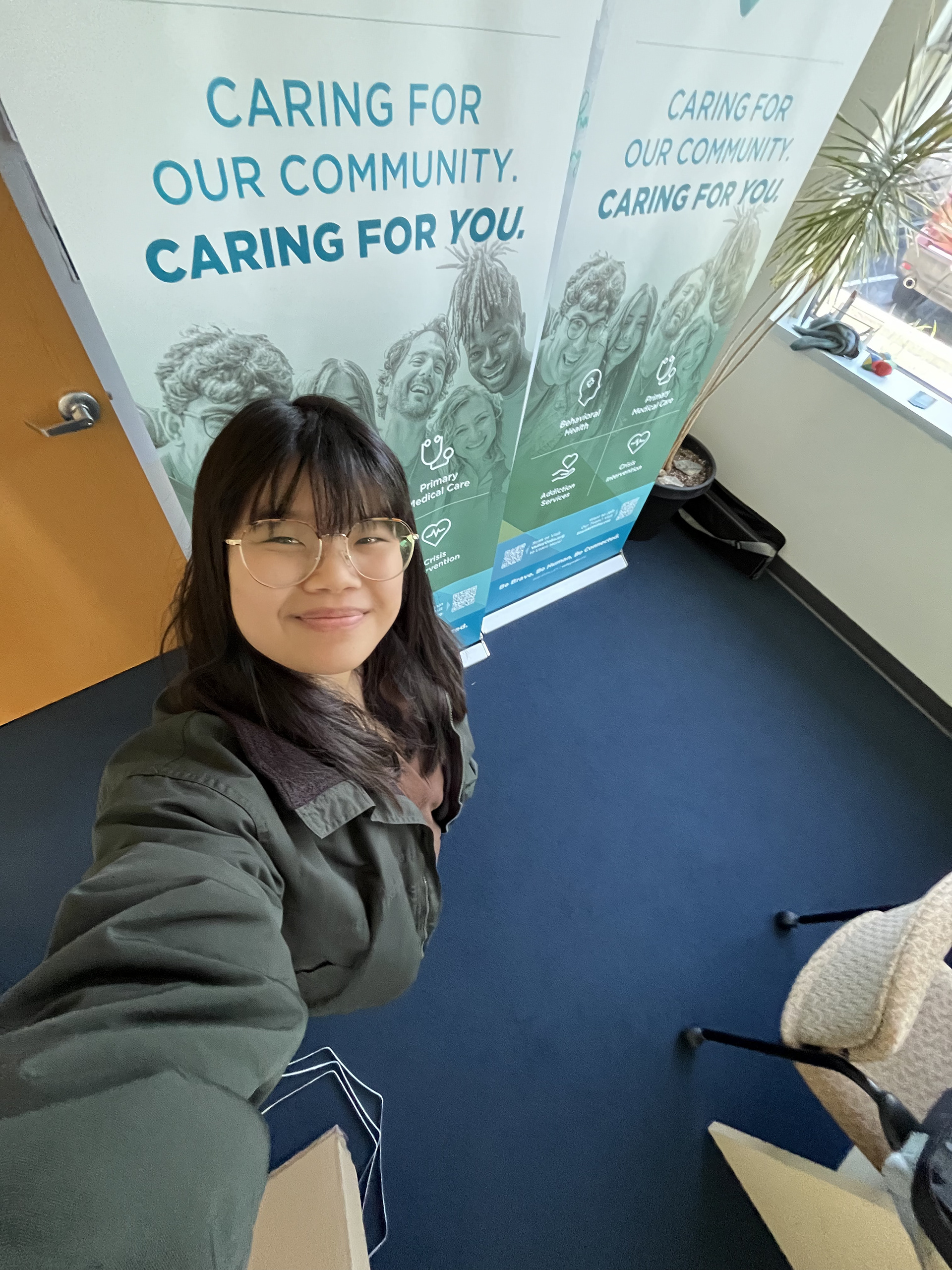Posing with my designed event banners!