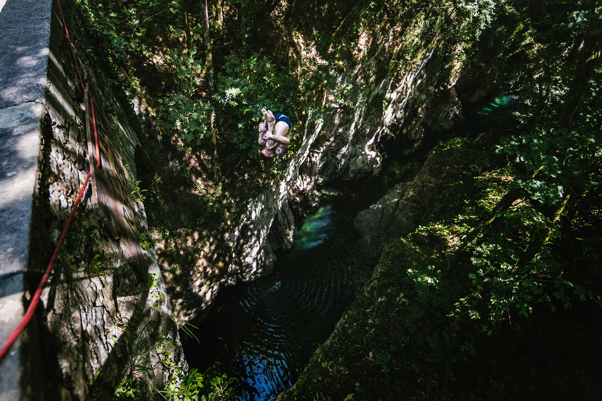 Alessandro De Rose of Italy dives in the Lima river during the Road To Cliff Diving Italy in Bagni di Lucca, Italy on June 7, 2017.