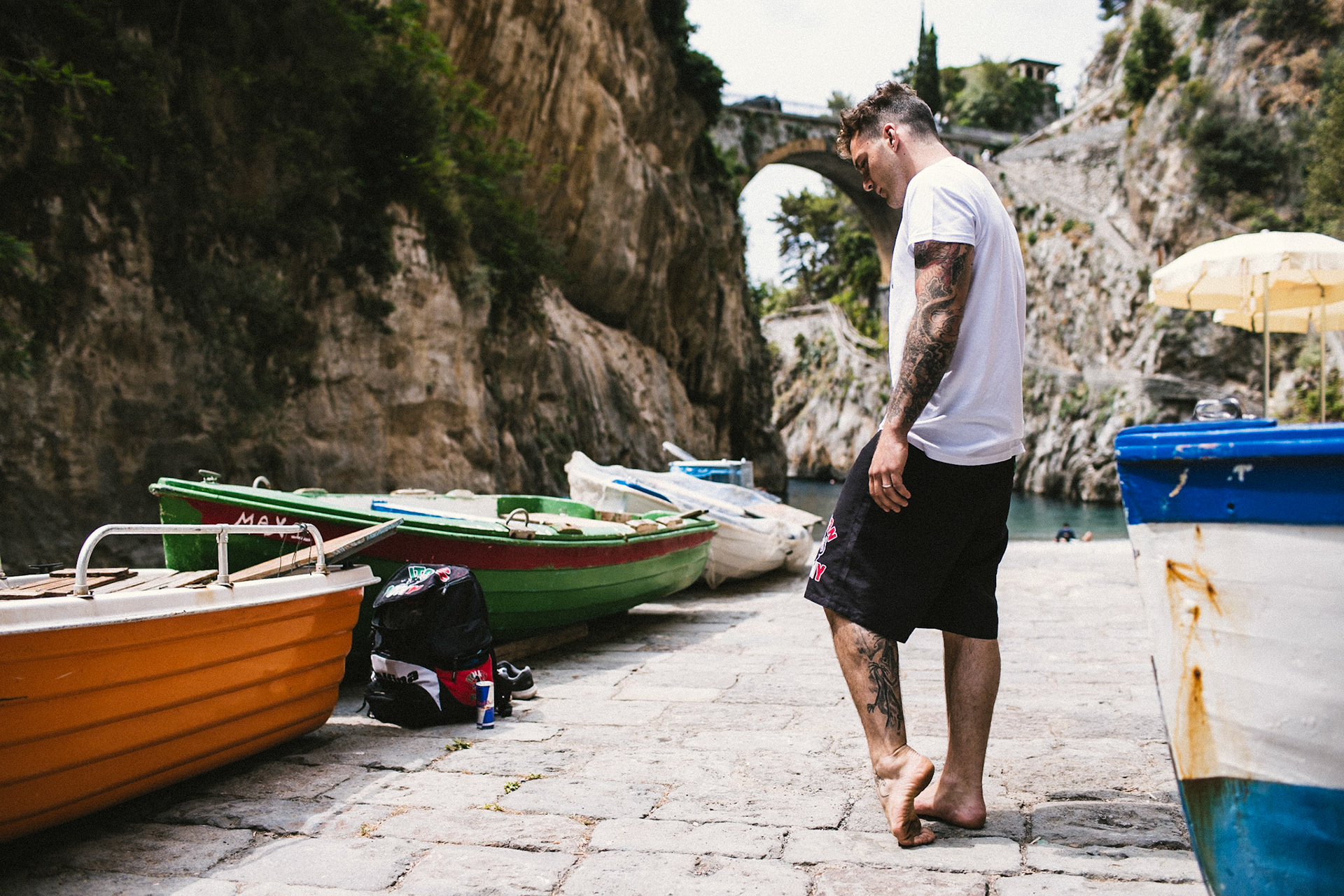 Alessandro De Rose of Italy warms up before diving during the Road To Cliff Diving Italy in Furore, Italy on June 6, 2017.