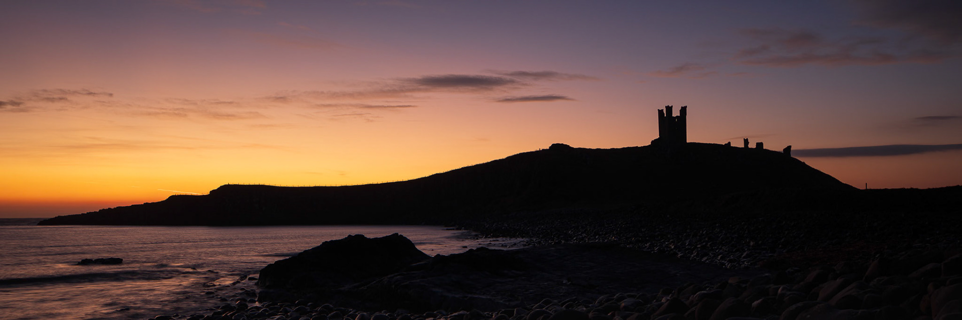 Dunstanburgh Castle at Sunrise