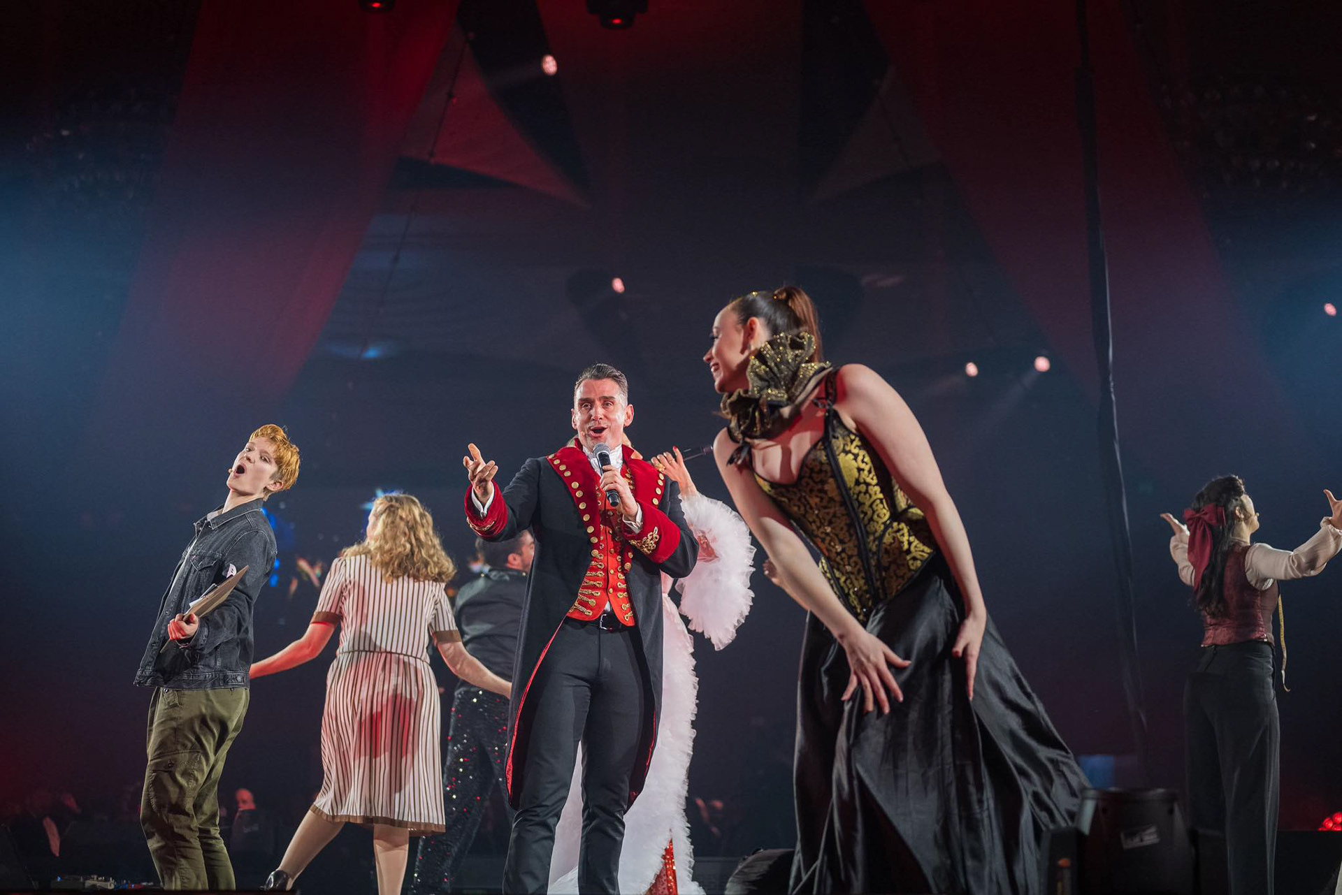 Singing in Crown Palladium (on the left) for a charity gala in 2025