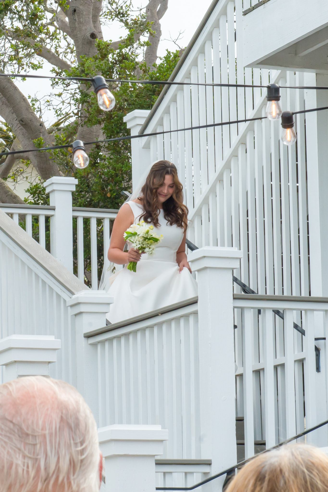 bride coming down the stairs