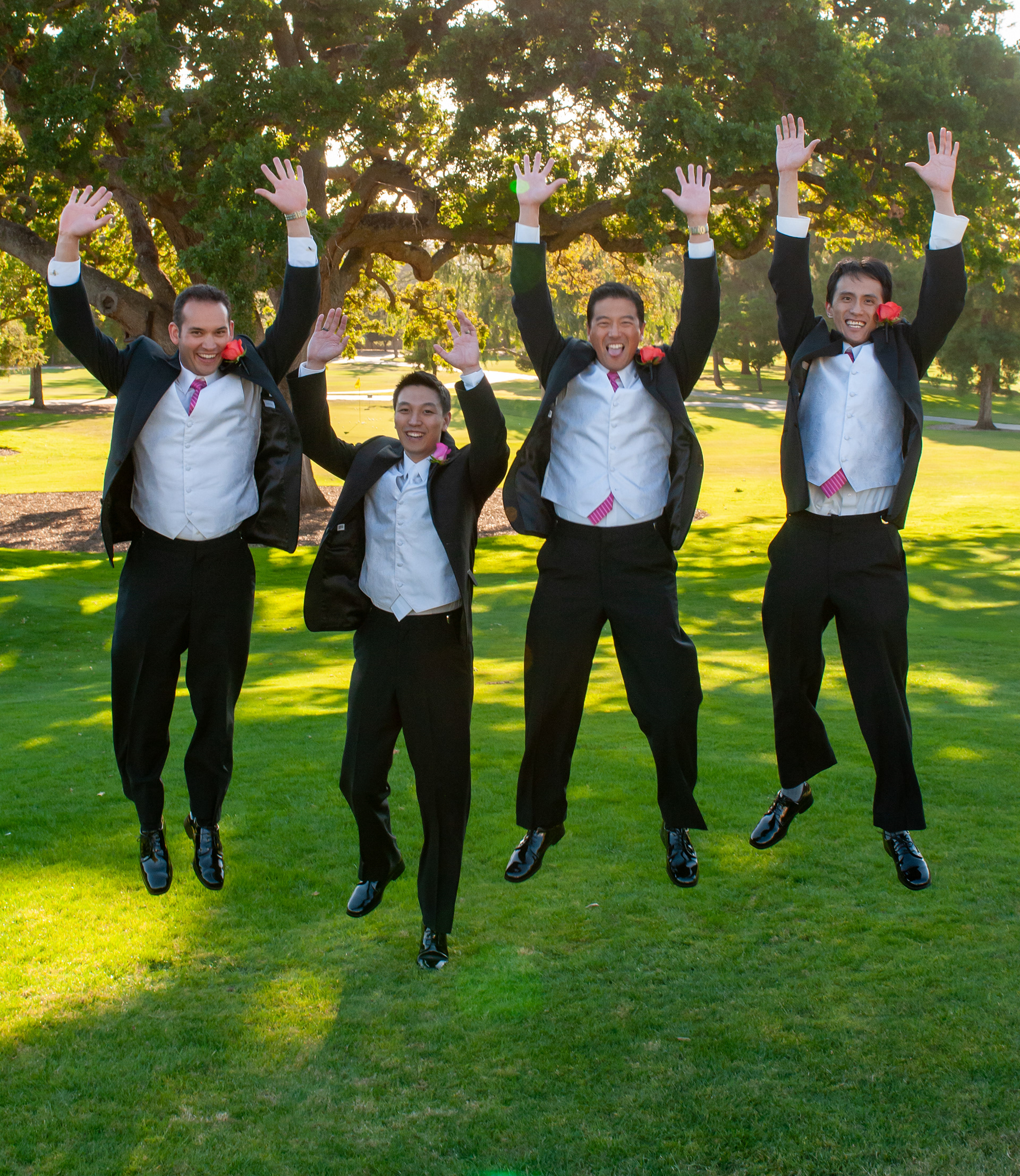 The entire wedding party gathered for a formal portrait on the fairways of San Jose Country Club — a timeless image framed by manicured greens and panoramic backdrops.