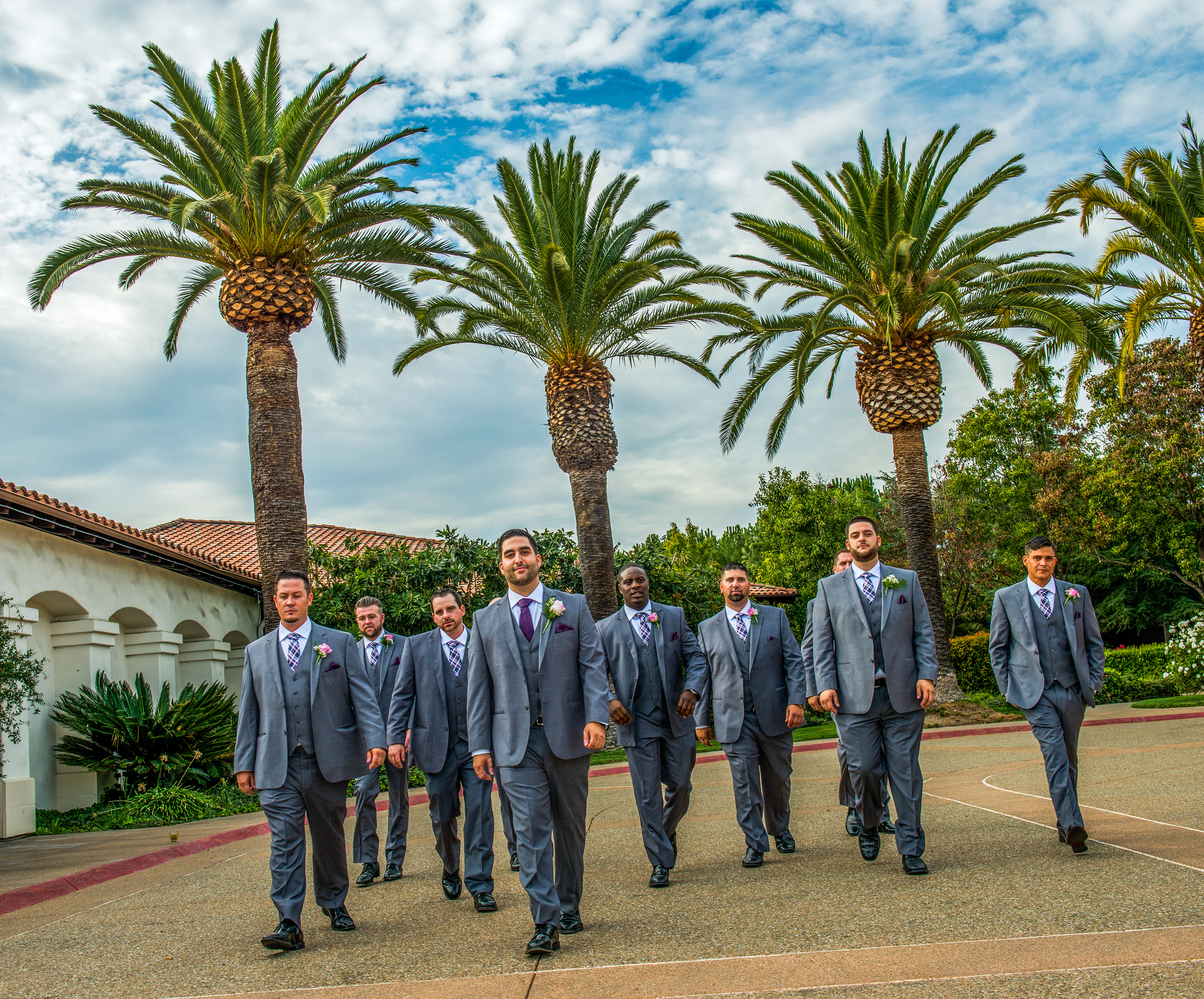 The role of groomsmen, or the groom’s court, is steeped in history and tradition, tracing back centuries