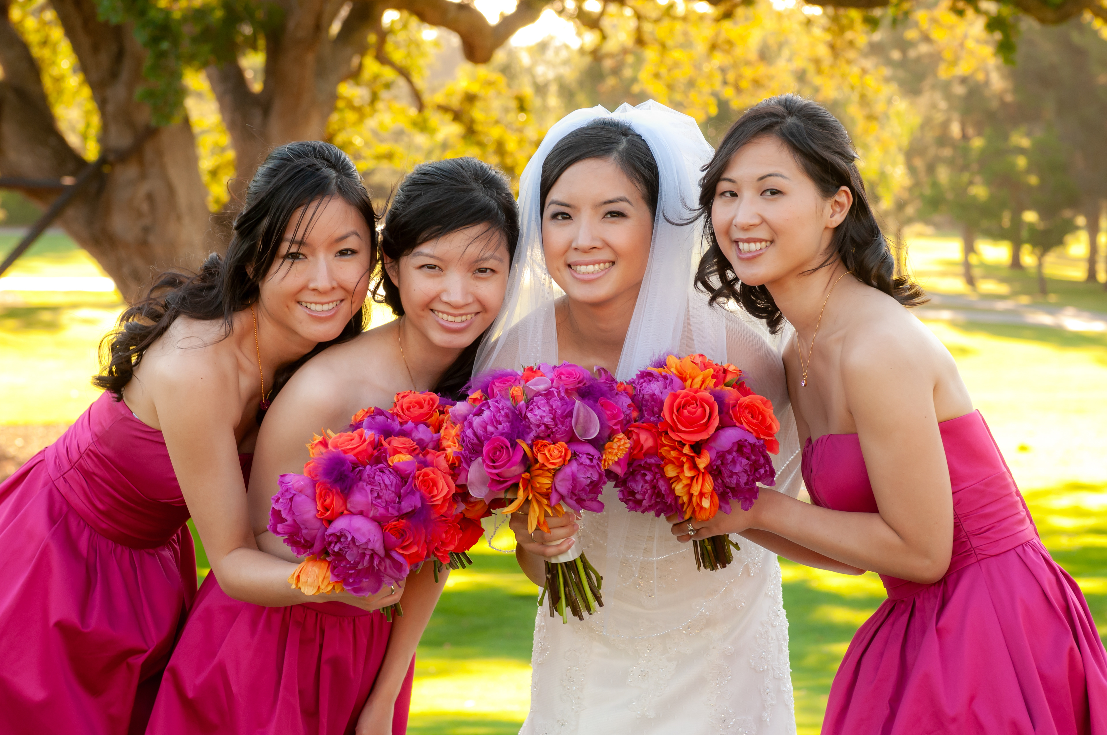 The entire wedding party gathered for a formal portrait on the fairways of San Jose Country Club — a timeless image framed by manicured greens and panoramic backdrops.