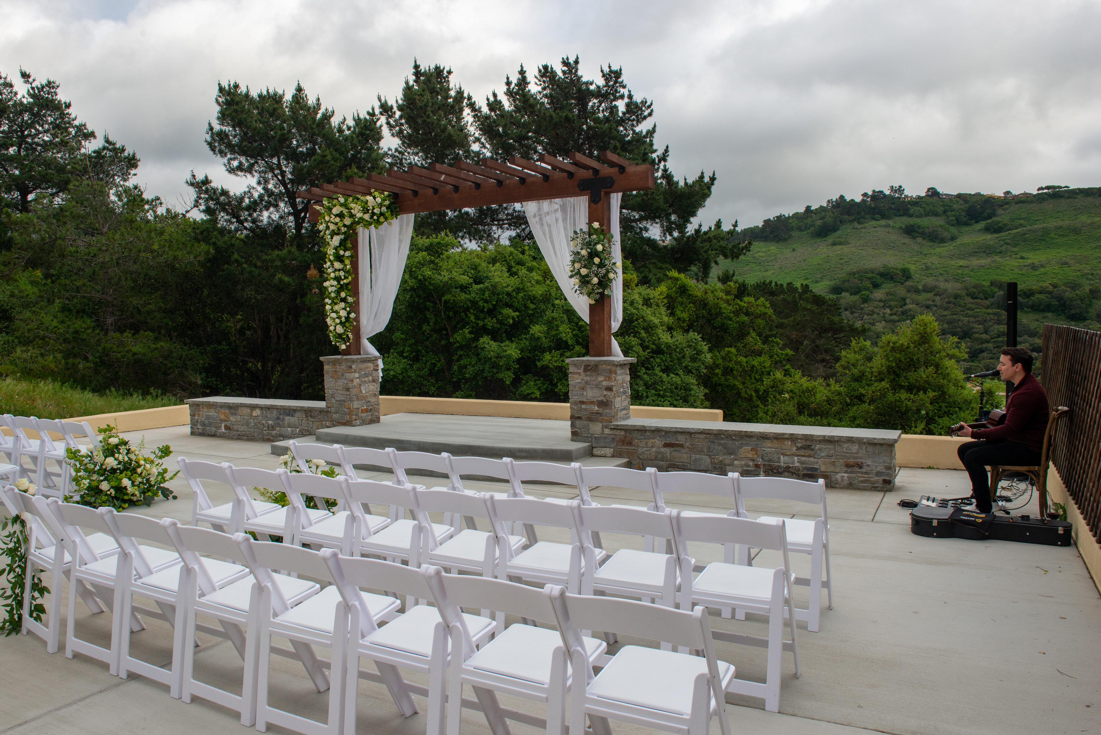 Fairview Laguna Seca outdoor ceremony with rolling hills and oak trees in Monterey