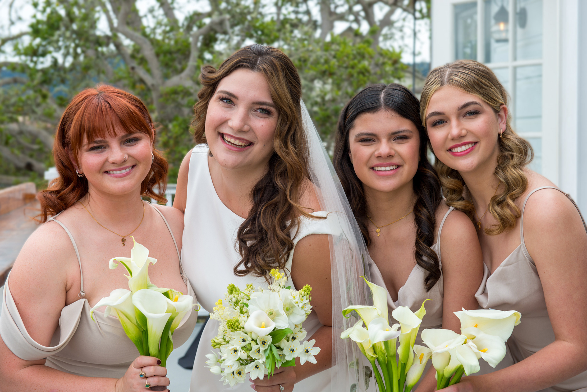 capturing a fun moment with bridesmaids on the patio