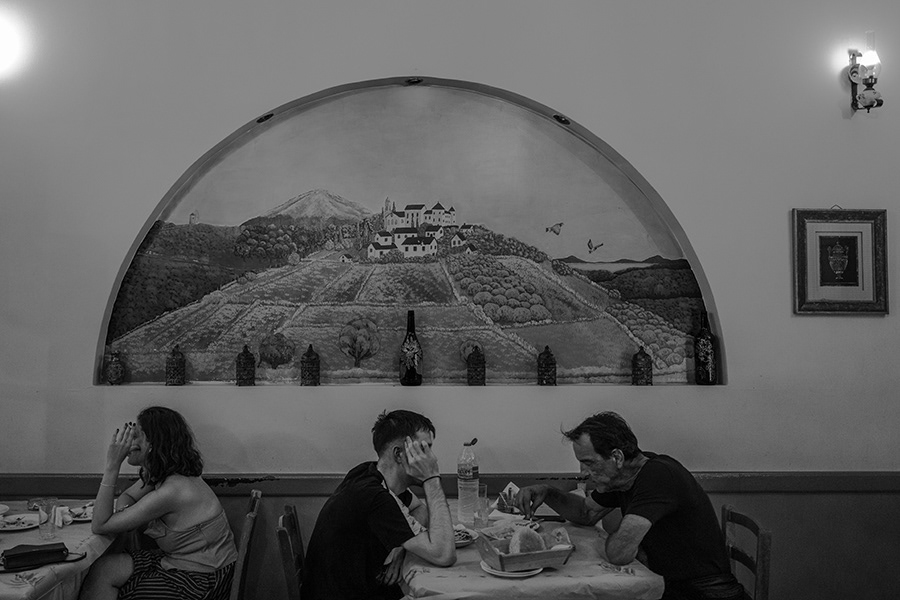 People having dinner in a traditional Greek tavern on the island of Lesvos    Lesvos in Greece ,2024