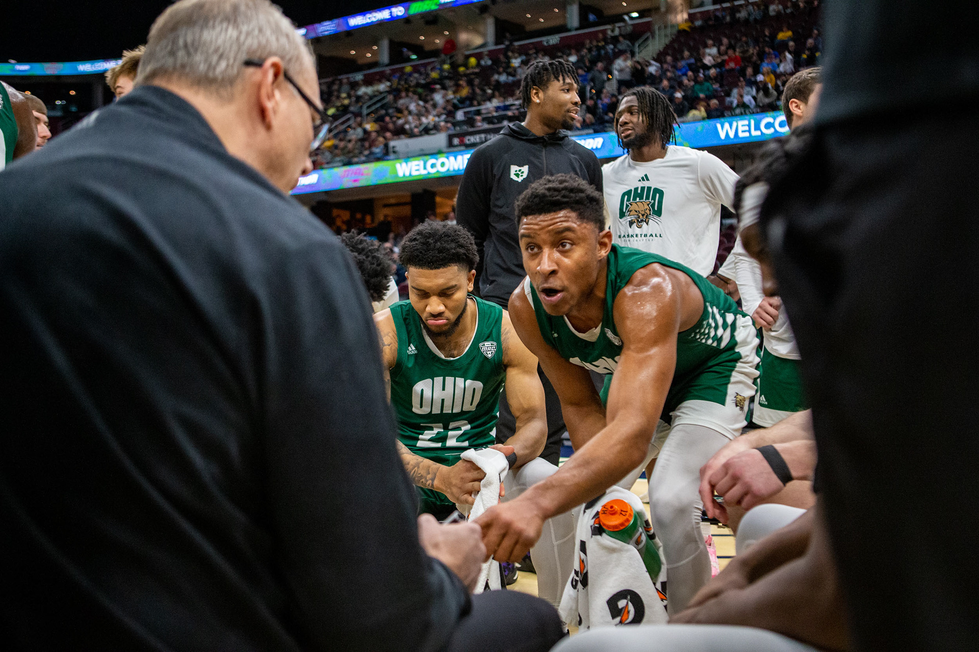 Ohio Guard Jaylin Hunter talks to Coach Boals during a timeout.