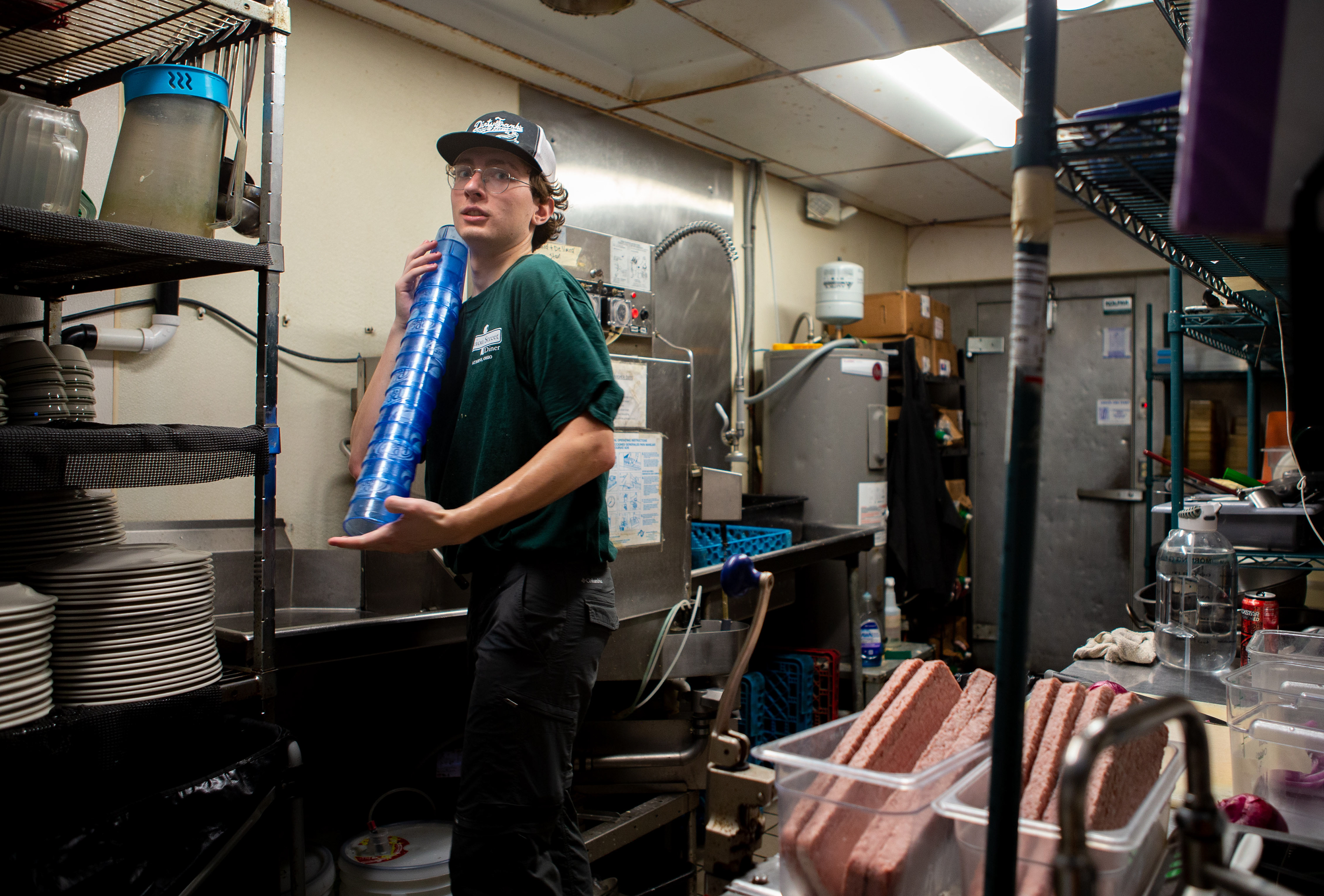 When he is not directing films, Brandes works at Union Street Diner in Athens, Ohio. Brandes is carrying cups in the back of the kitchen to the front of the house.