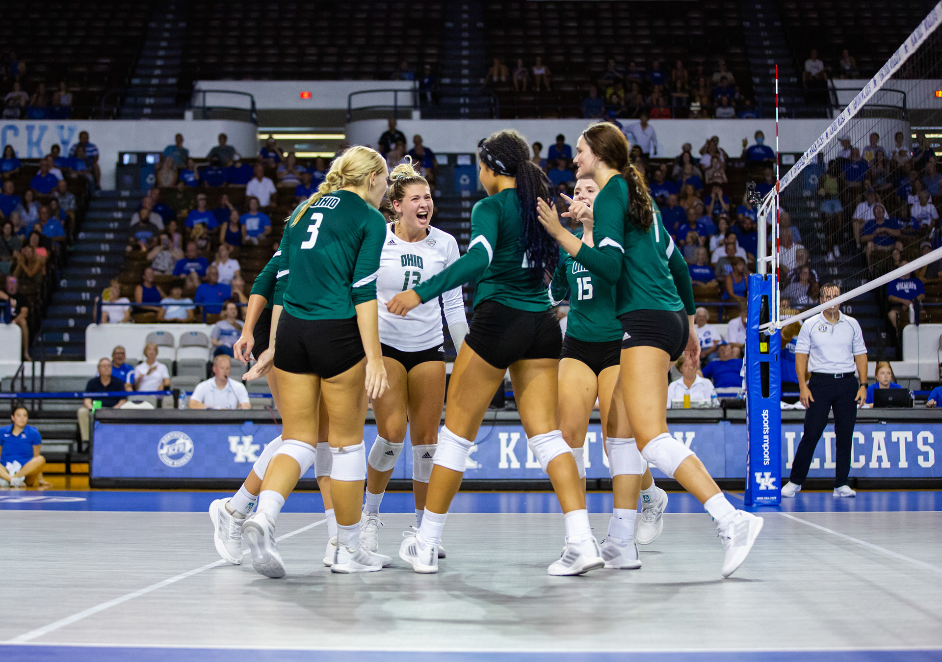 The Ohio Bobcats cheer after scoring a point.