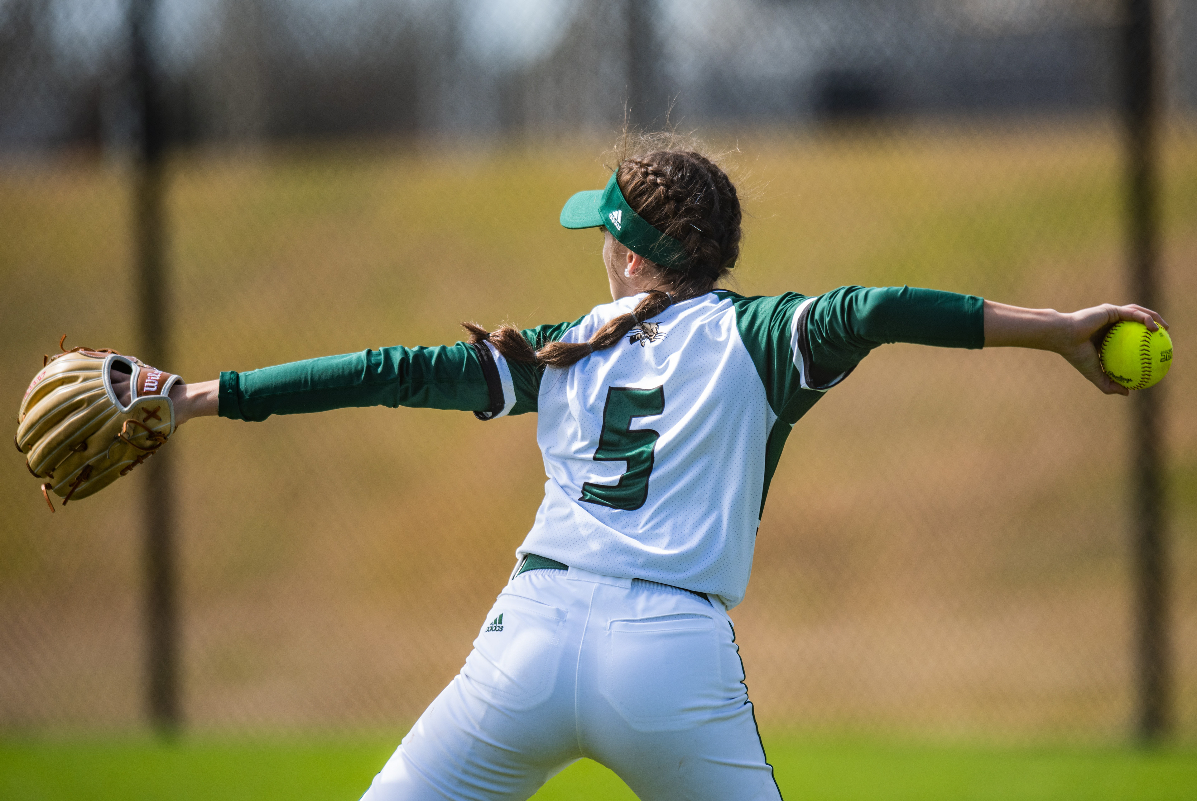 Ohio Outfielder CiCi Keidel throws a ball to Ohio Pitcher Mackensie Kohl in Beaumont, Texas..