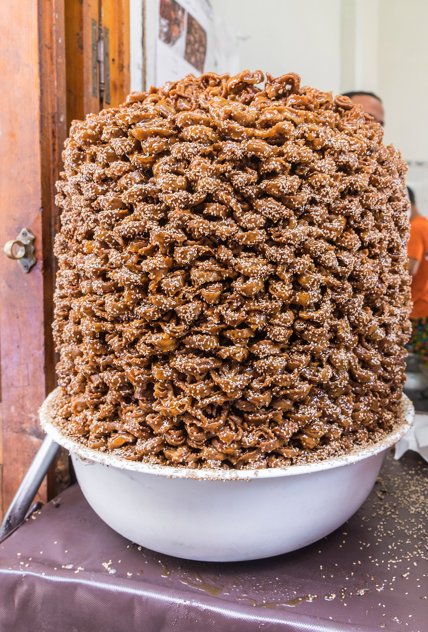 Shebakia or chabakiya, Flower shaped, deep fried sesame cookies dipped in honey are a favourite in the Medina, Rabat, Morocco