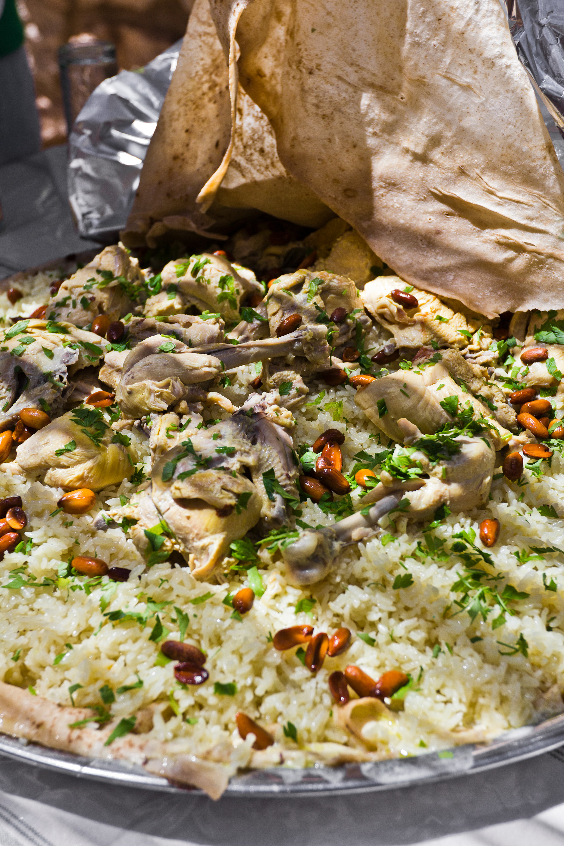 Mansaf (Bedouin dish-Jordanian National Dish of Shrak Bread soaked in yogurt with spiced rice and Chicked or lamb), Iraq Al-Ameer Women's Association, Jordan