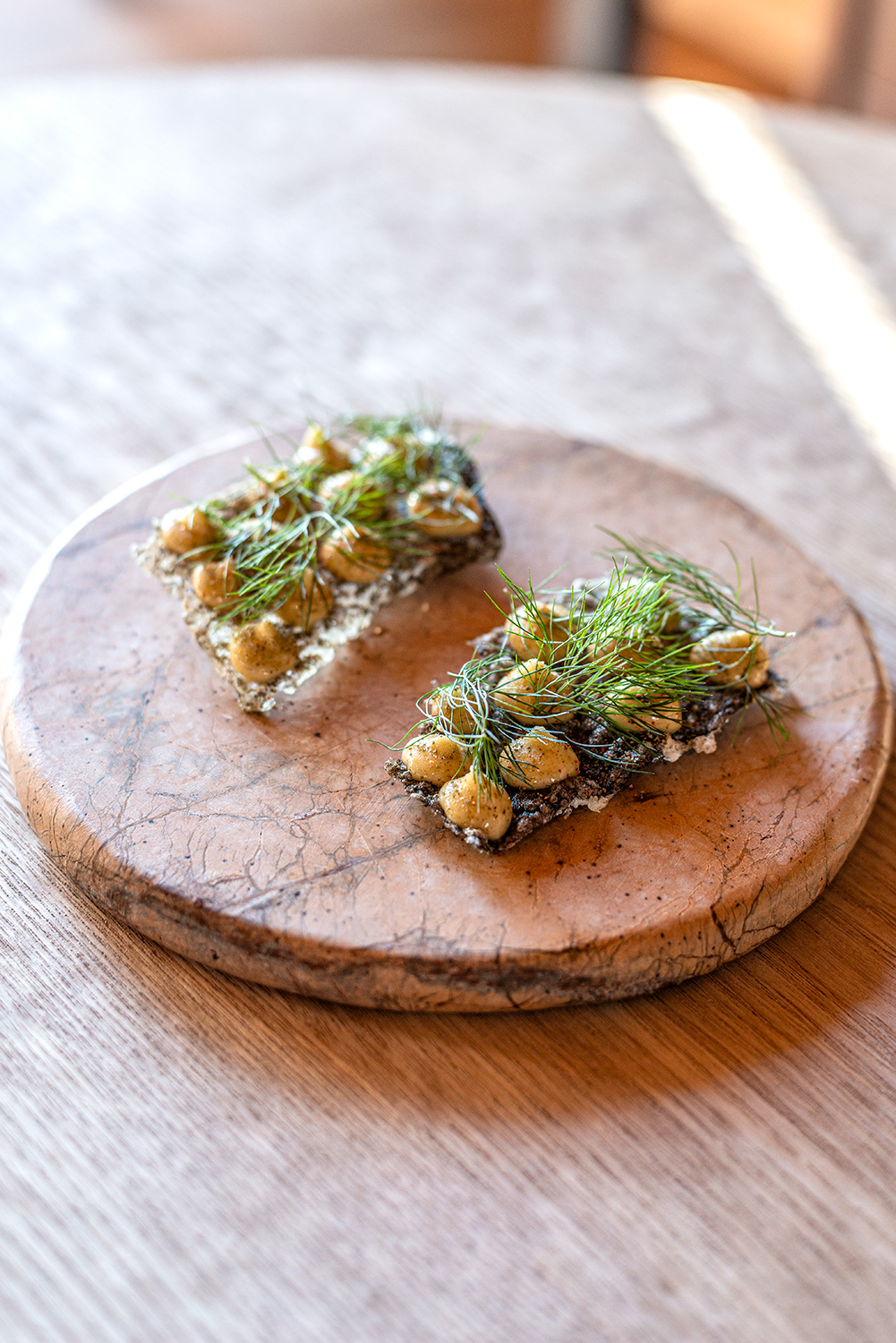 Crispy salmon skin, muscle cream & fresh dill - Gourmet Restaurant Experience - Cultural Farm Bjerkem - Trøndelag