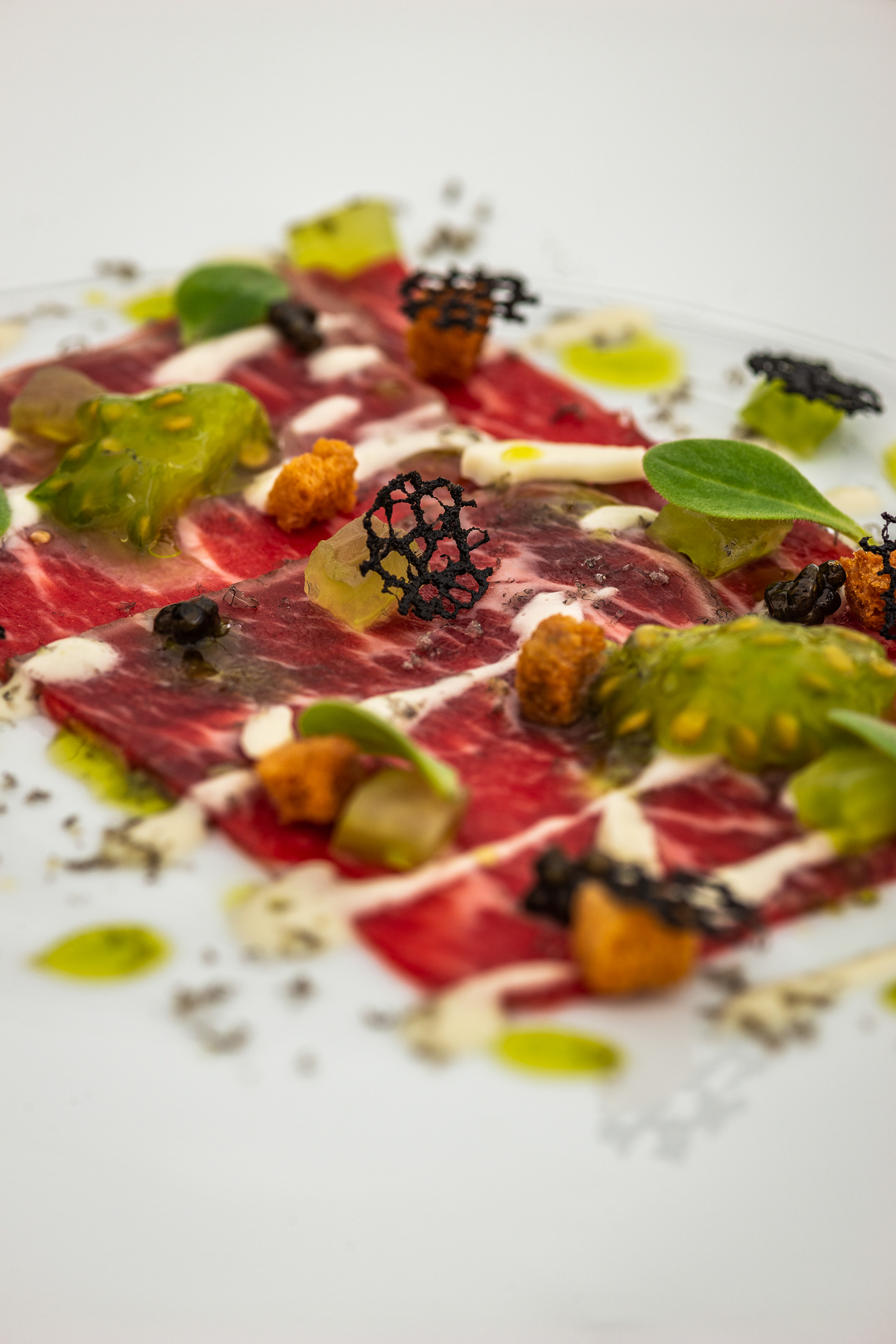 Charcuterie, tomato and cheese starters at restaurant Les Jardins d’Anaïs - Lux City